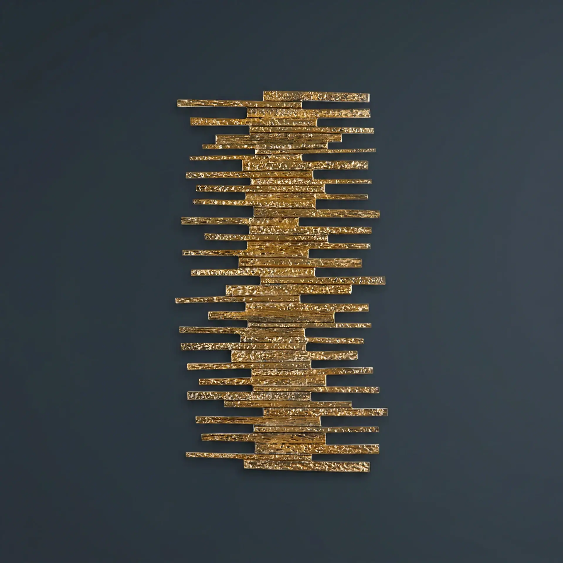 Gold metallic ledger wall decor piece for modern interior design.