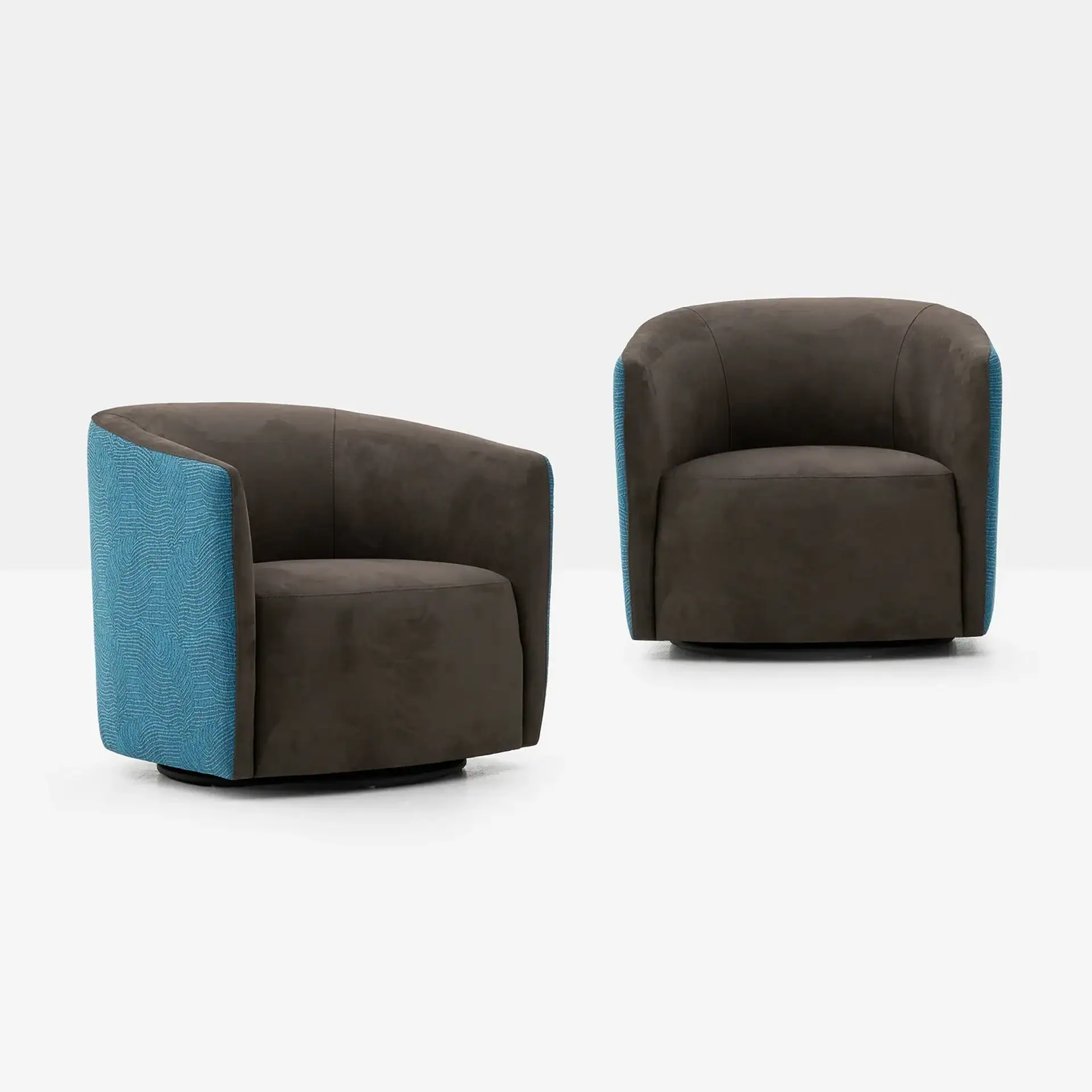 Sklar Furnishings Mila Swivel Chair with blue side panels and dark upholstery.