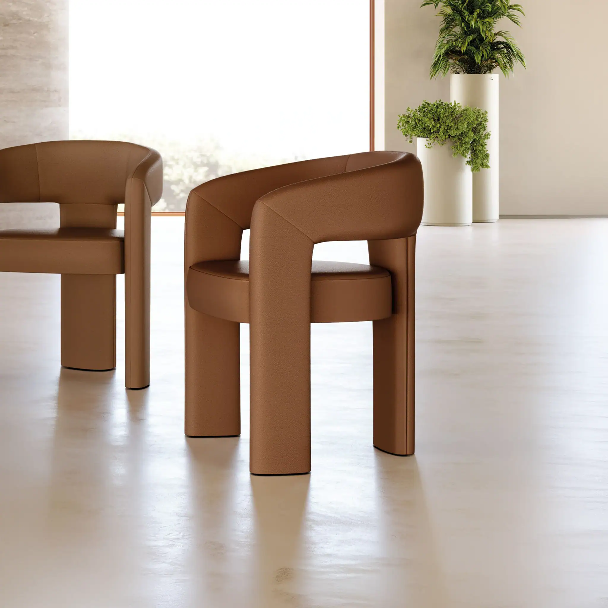 Modern Egle dining chair with curved design in a contemporary setting.