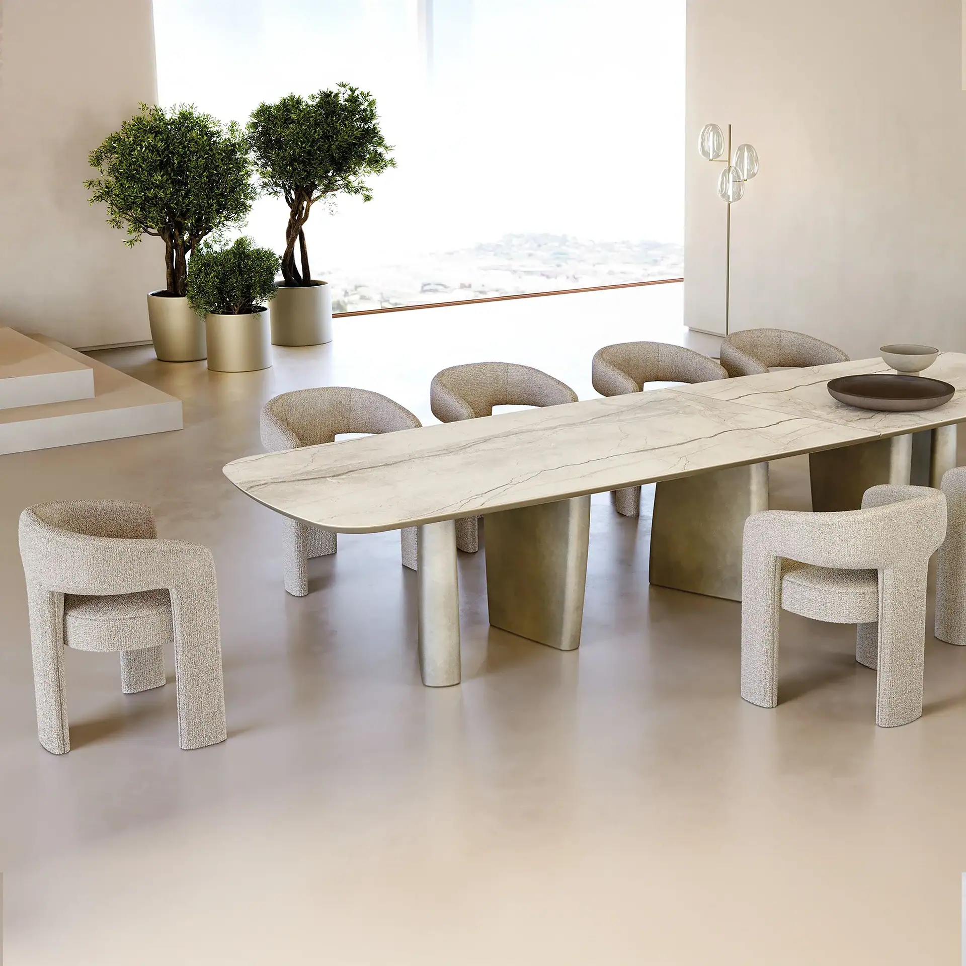 Modern dining room with Egle chairs and a marble table, minimalist decor, and natural light.