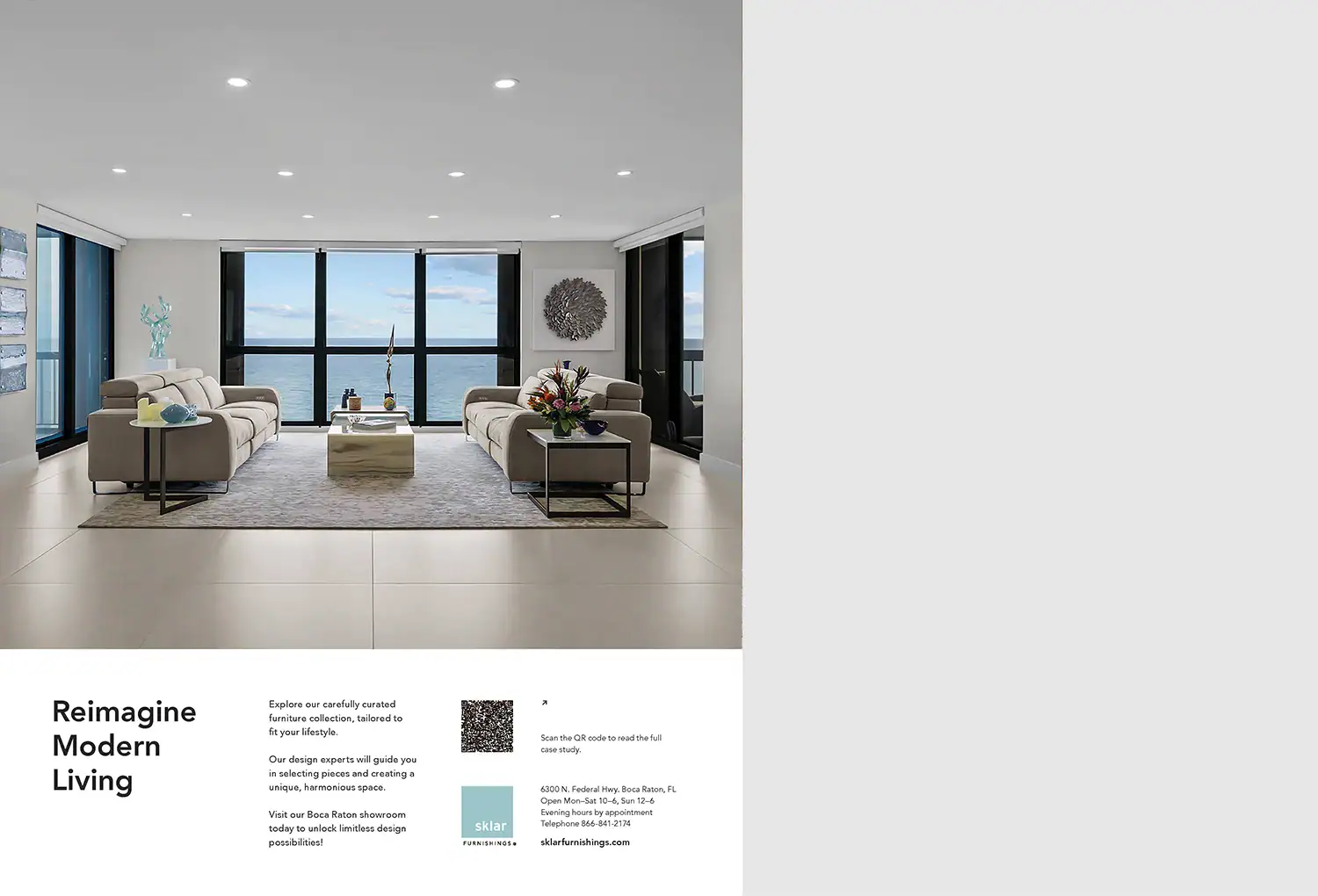 Modern living room with ocean view, stylish furniture, and large windows.