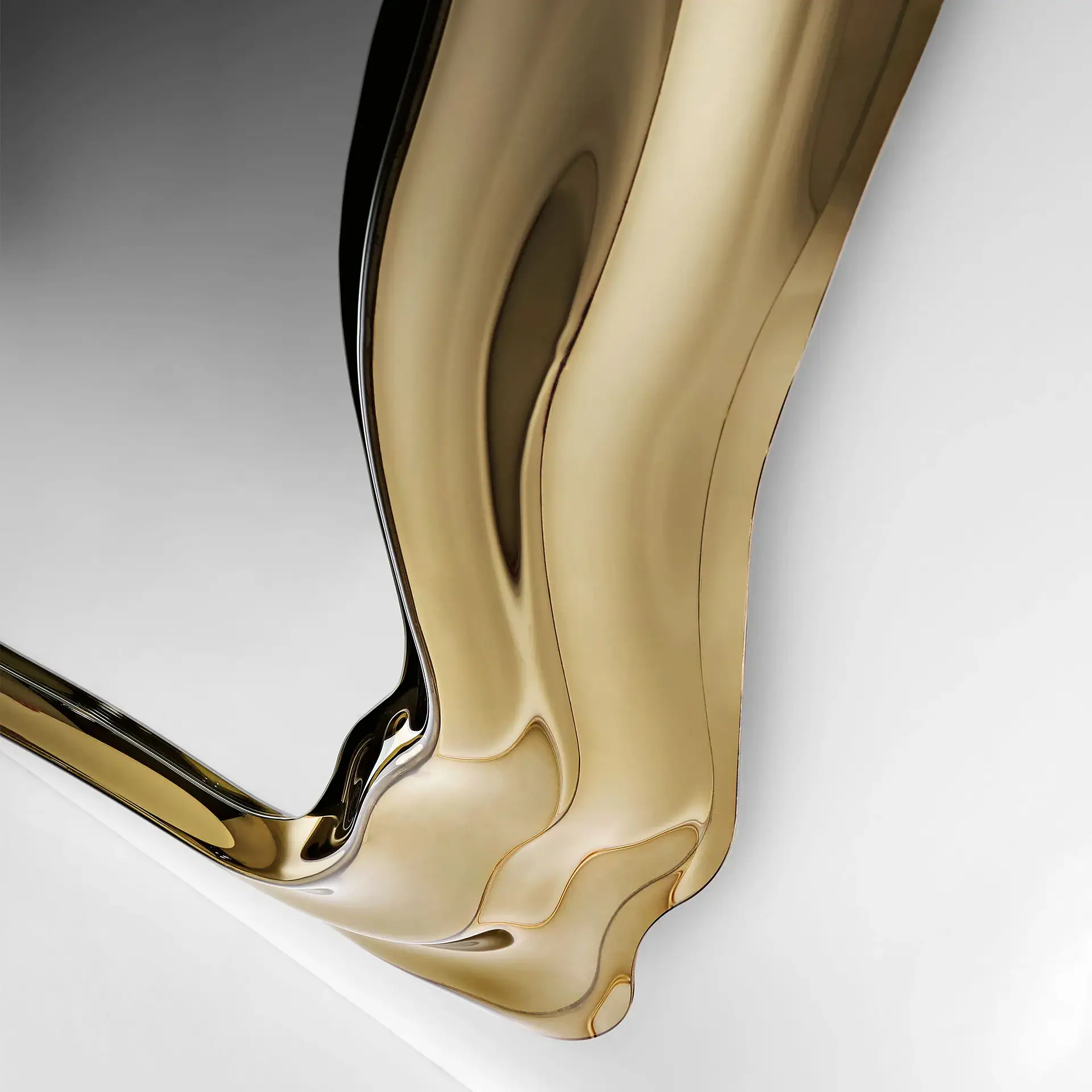 Elegant wall mirror with a gold and black frame from Sklar Furnishings.
