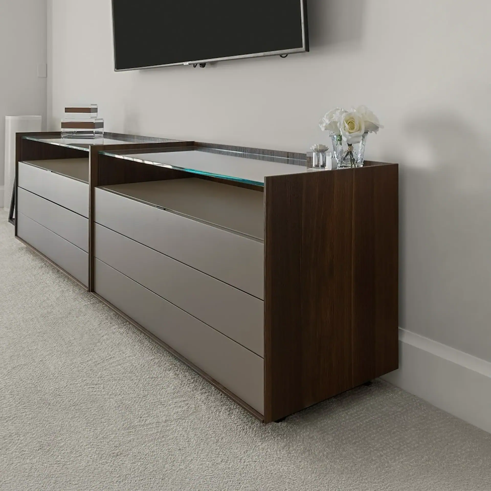 Elegant wooden TV stand with glass surface, perfect for contemporary living rooms.