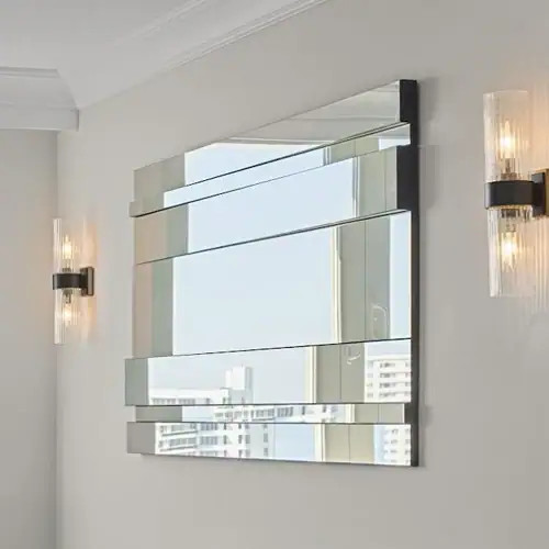 LED wall mirror with sleek, contemporary design for stylish home decor.