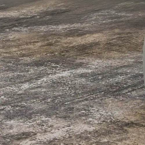 Stone surface with textured, natural appearance for furniture, countertops, and interior design.