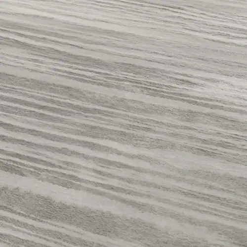 Close-up of white and gray wood grain surface, showcasing natural texture and pattern.