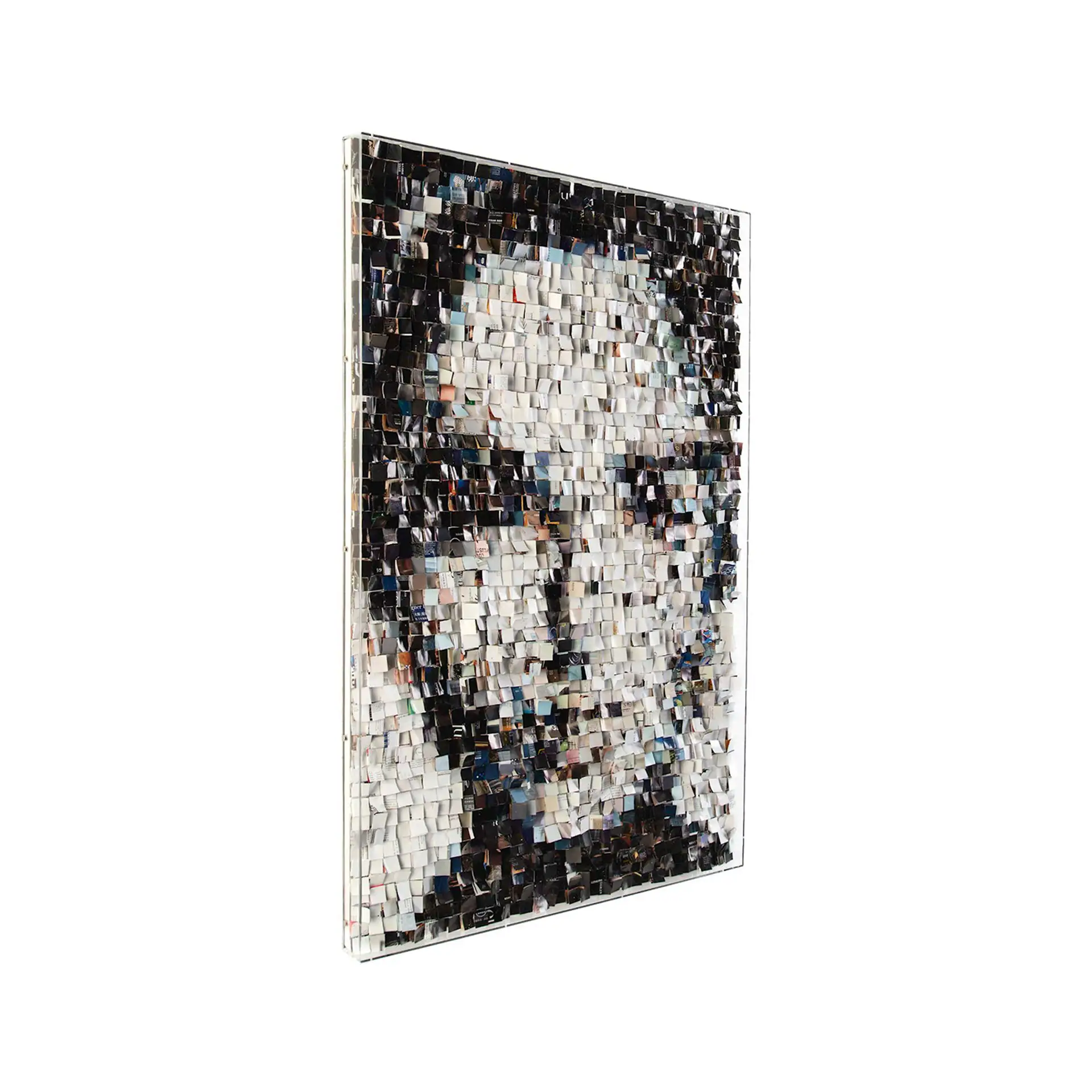 Mosaic portrait artwork featuring a detailed face made of small tiles.