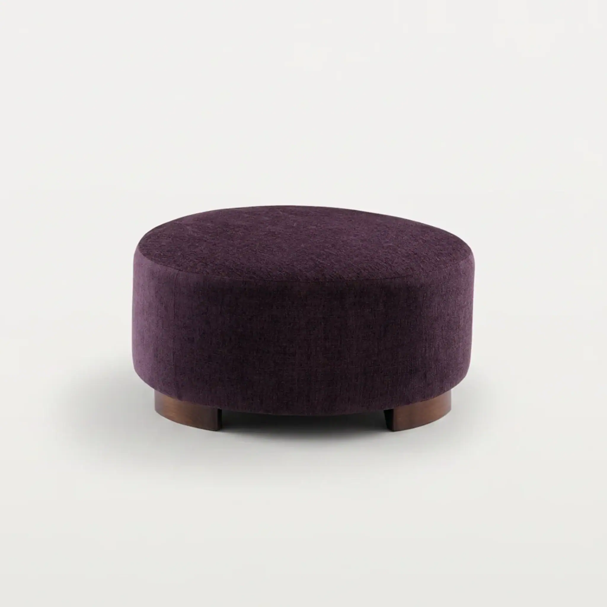 Purple ottoman with a plush fabric finish, perfect for modern living room seating and accent furnitu.