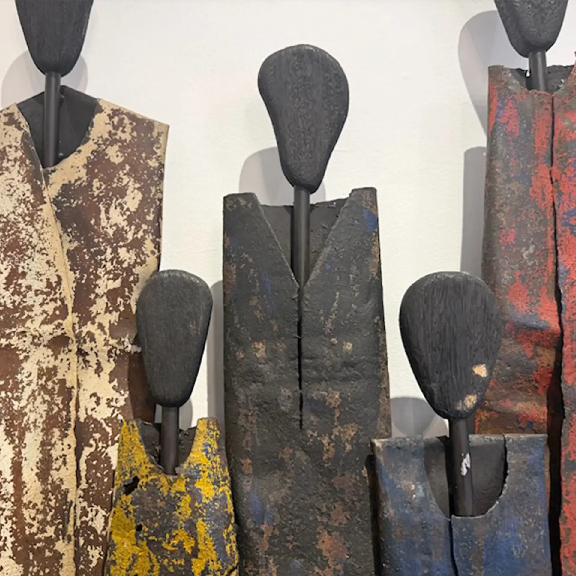 Abstract metal sculptures with textured finishes in earthy tones, ideal for contemporary interior de.