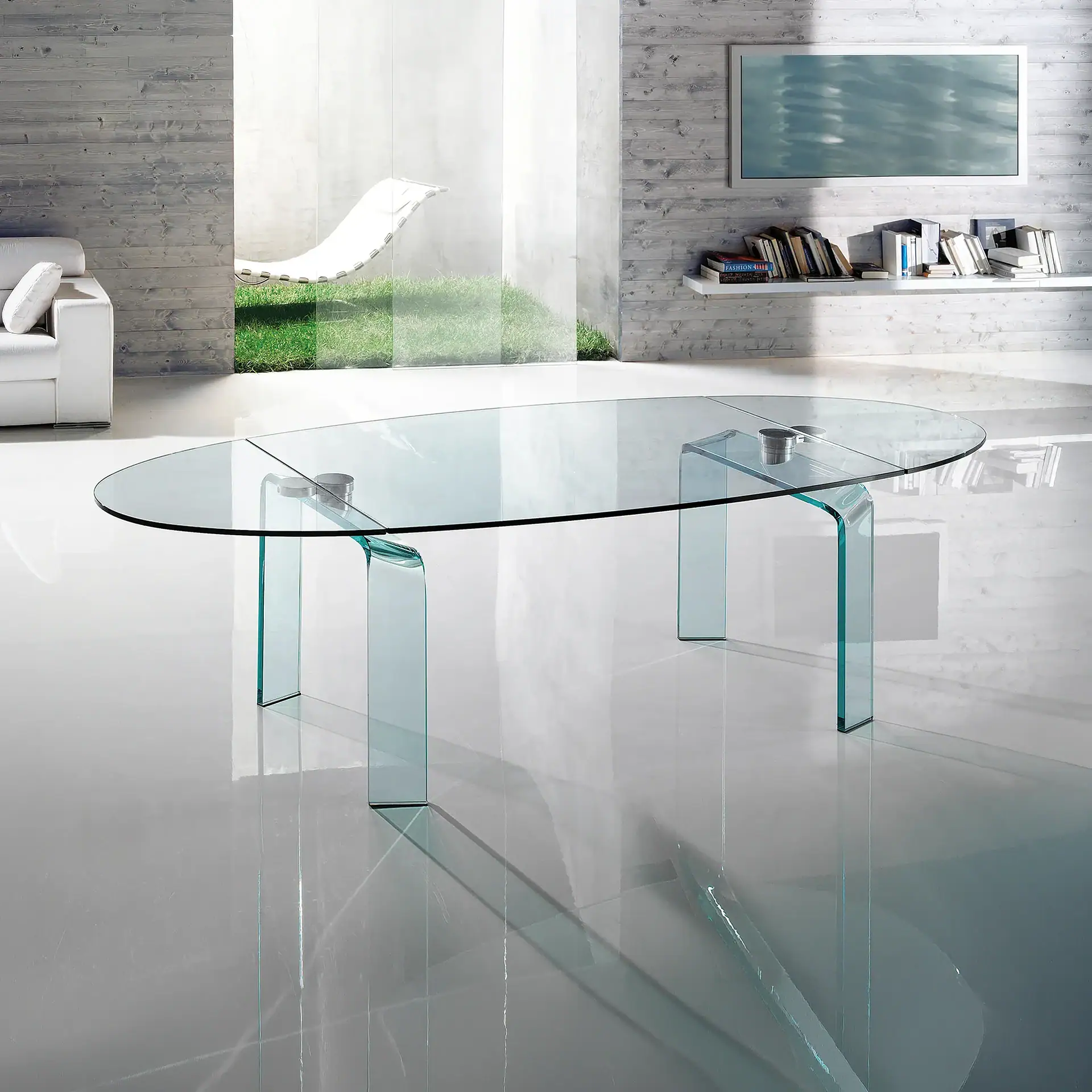 Modern glass extending dining table in contemporary living space.