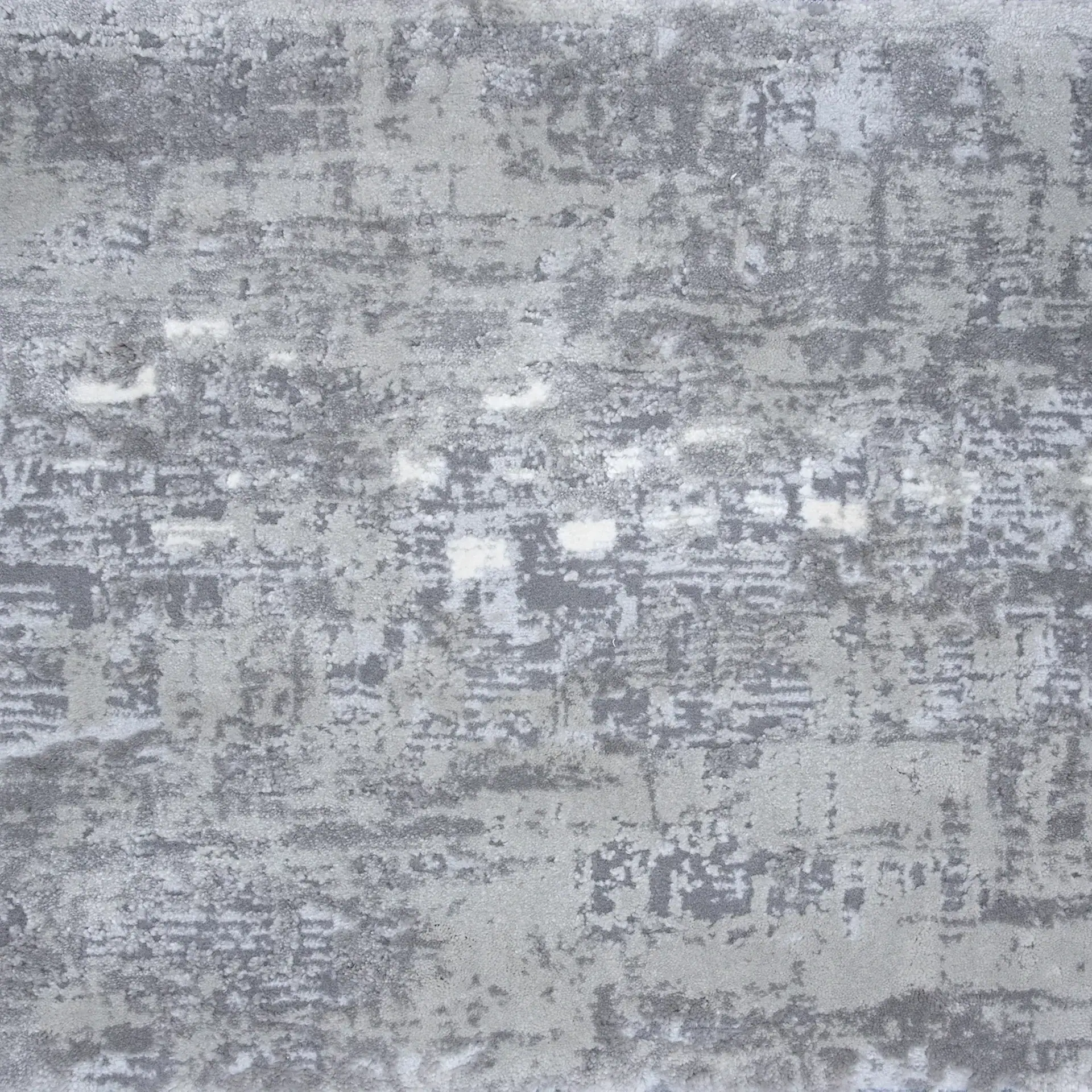 Modern textured concrete wall with distressed finish for industrial interior design.