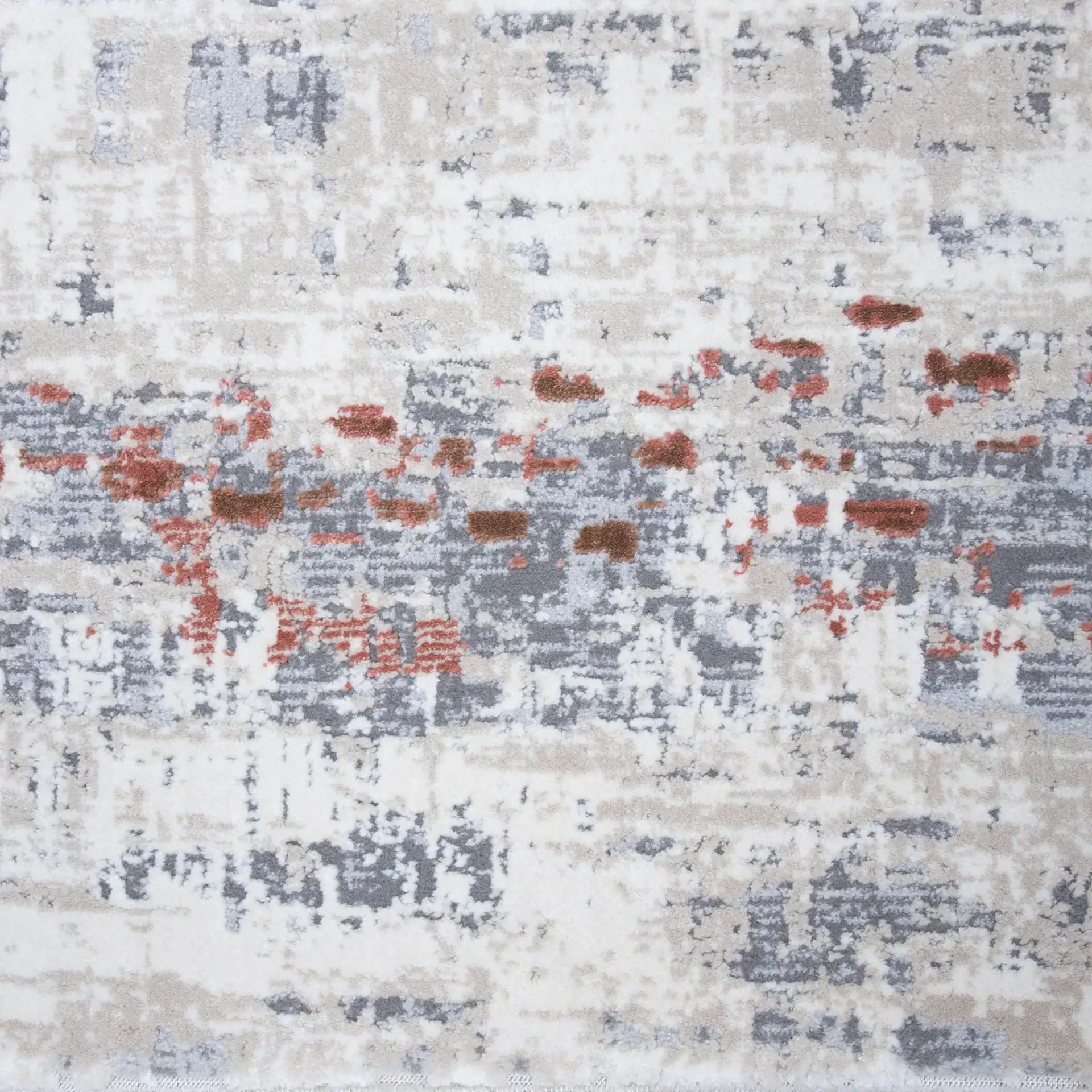 Contemporary abstract area rug featuring blue, gray, and rust tones for stylish home decor.