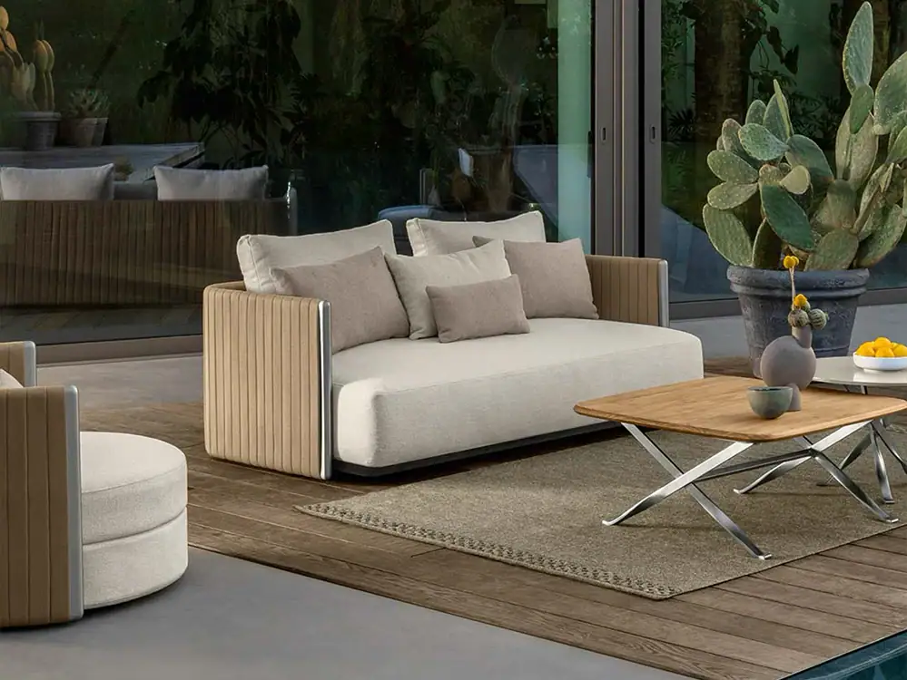 Elegant beige sofa with wooden accents, perfect for contemporary living rooms.