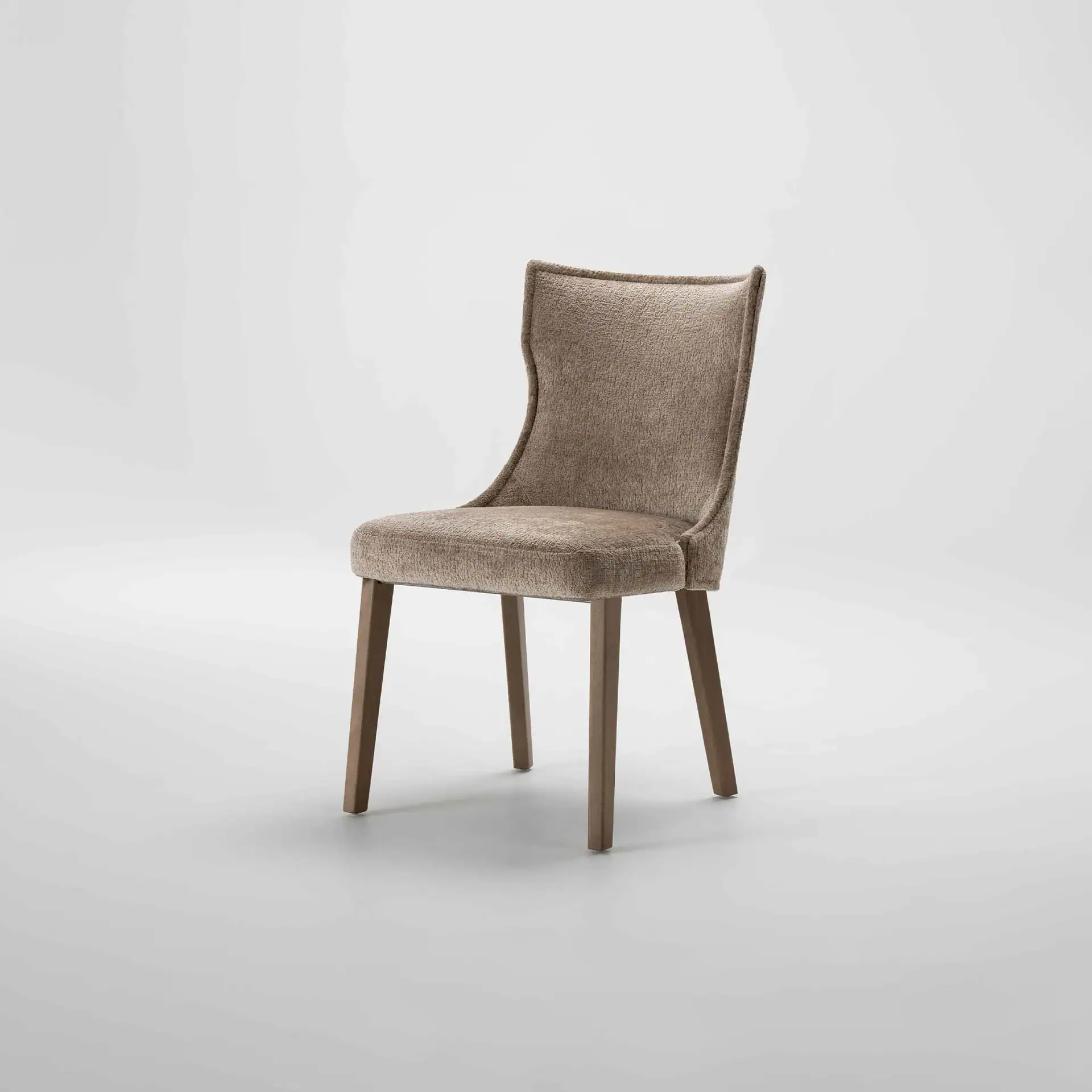 Upholstered dining chair with wooden legs, perfect for modern dining rooms and kitchen spaces. Comfo.