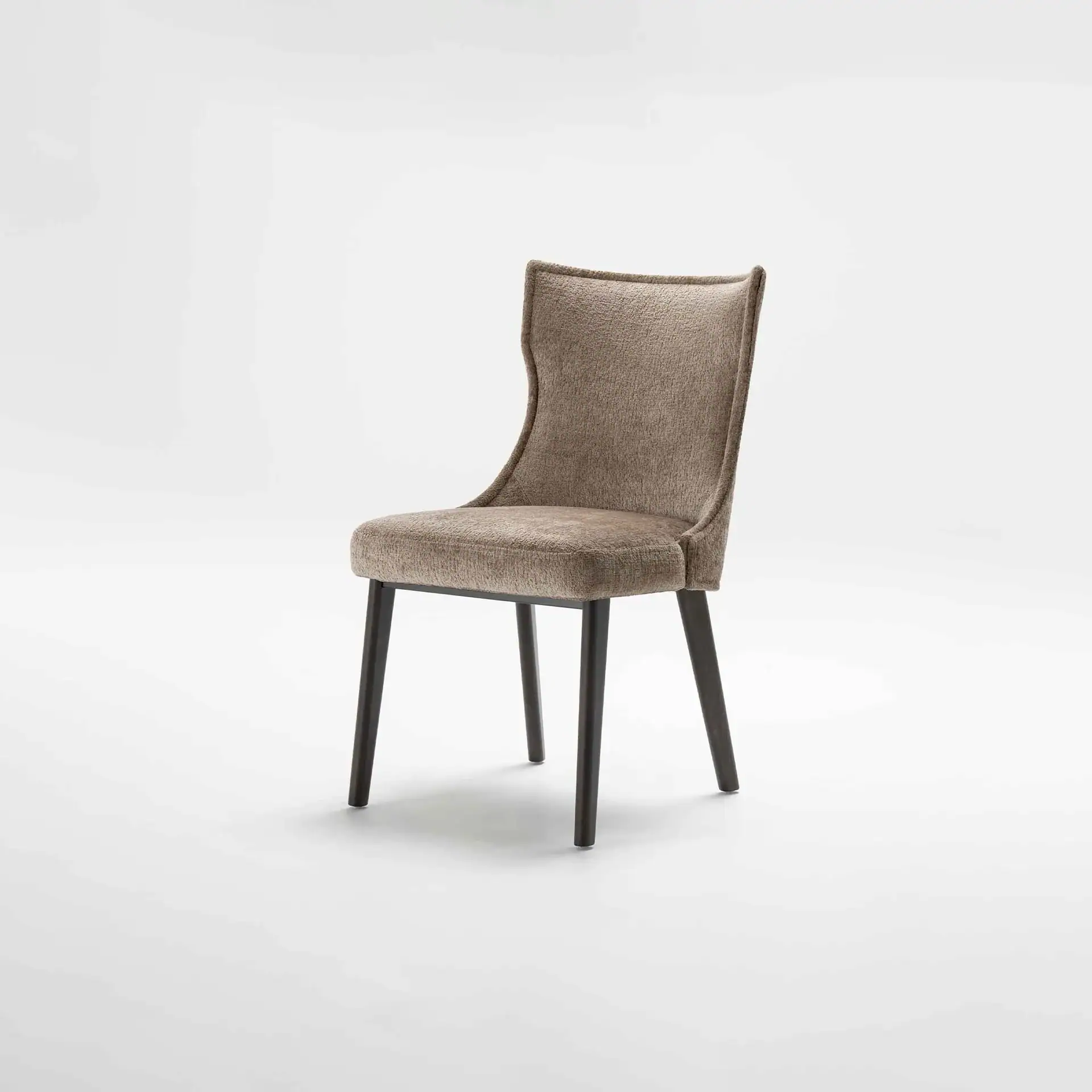 Elegant beige upholstered dining chair with dark wooden legs for stylish interiors.