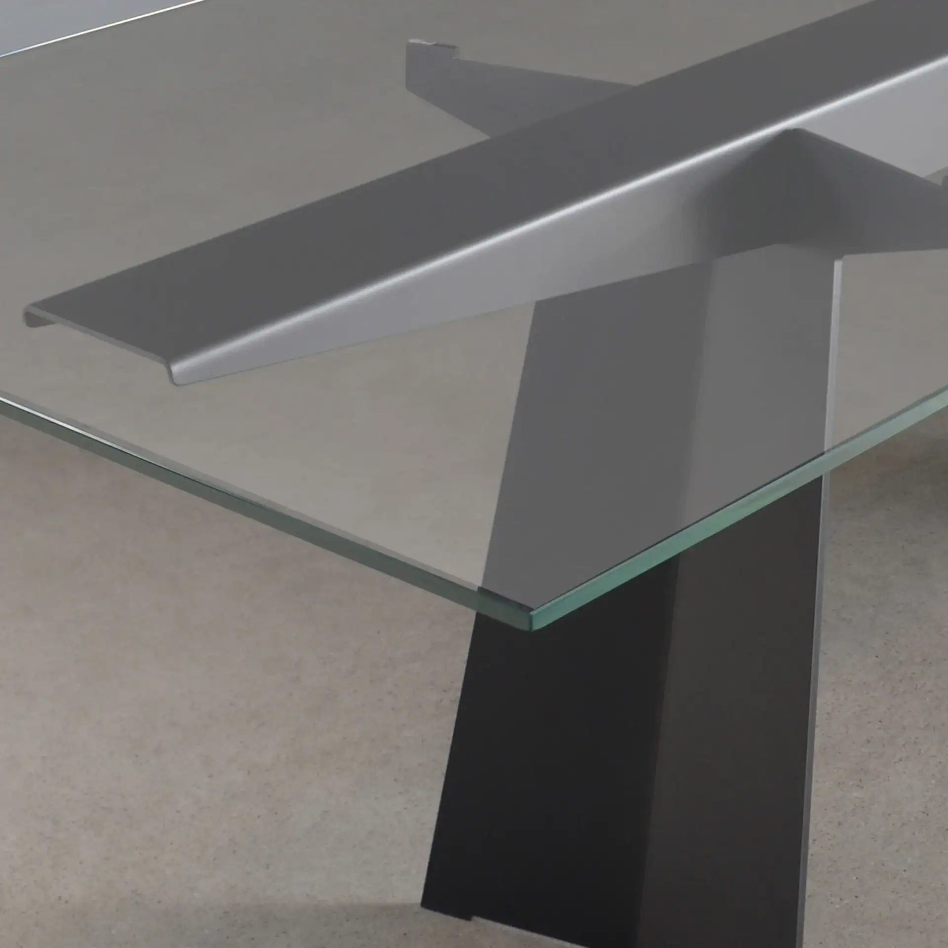 Conference table with glass top and metal frame for modern office spaces.