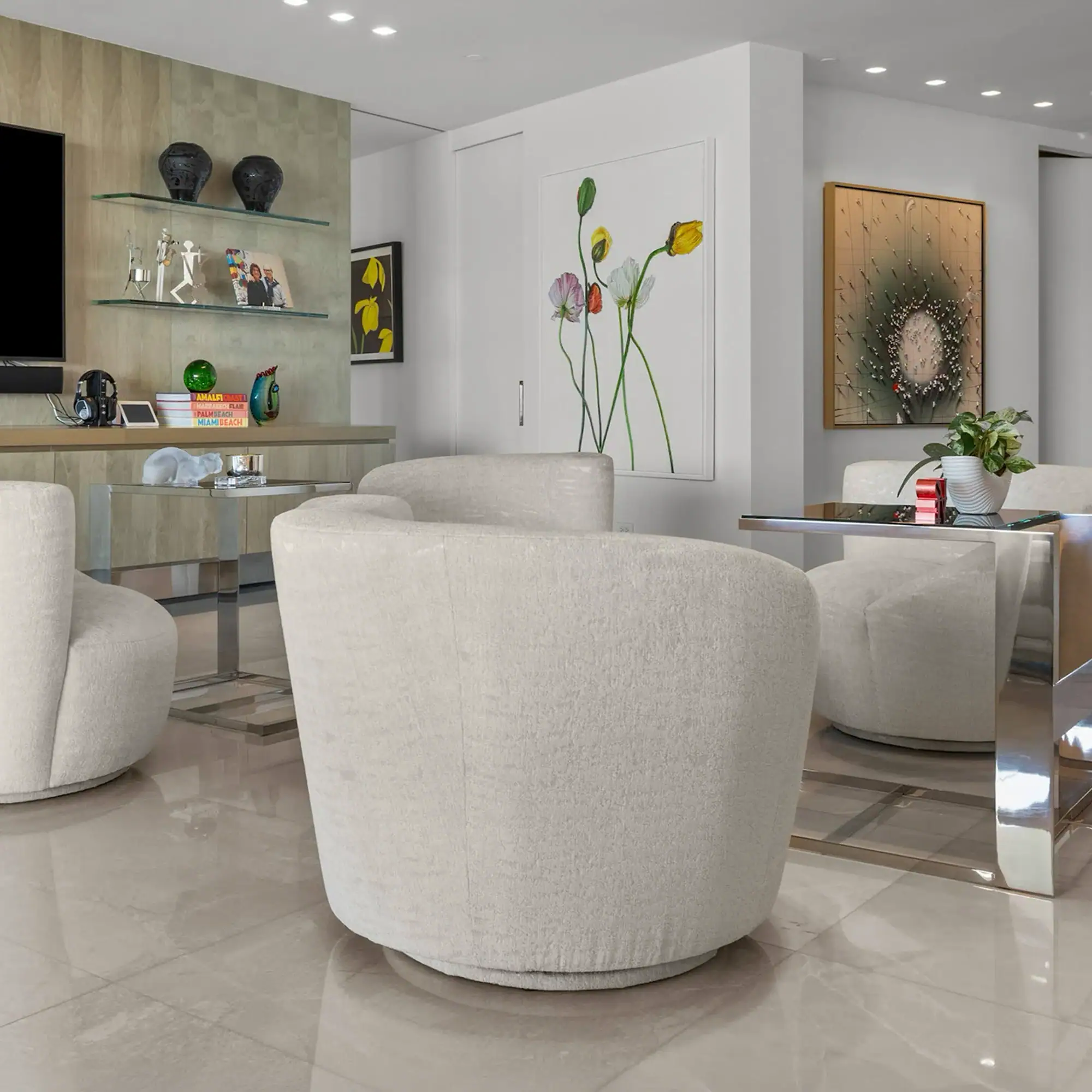 Modern Living Room with Art Decor Contemporary living room with white armchairs and colorful wall art.