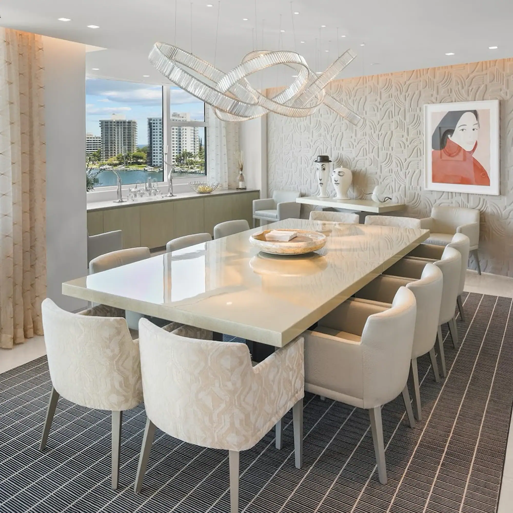 Modern Waterfront Dining Room Elegant dining room with large windows and a view of the city skyline.