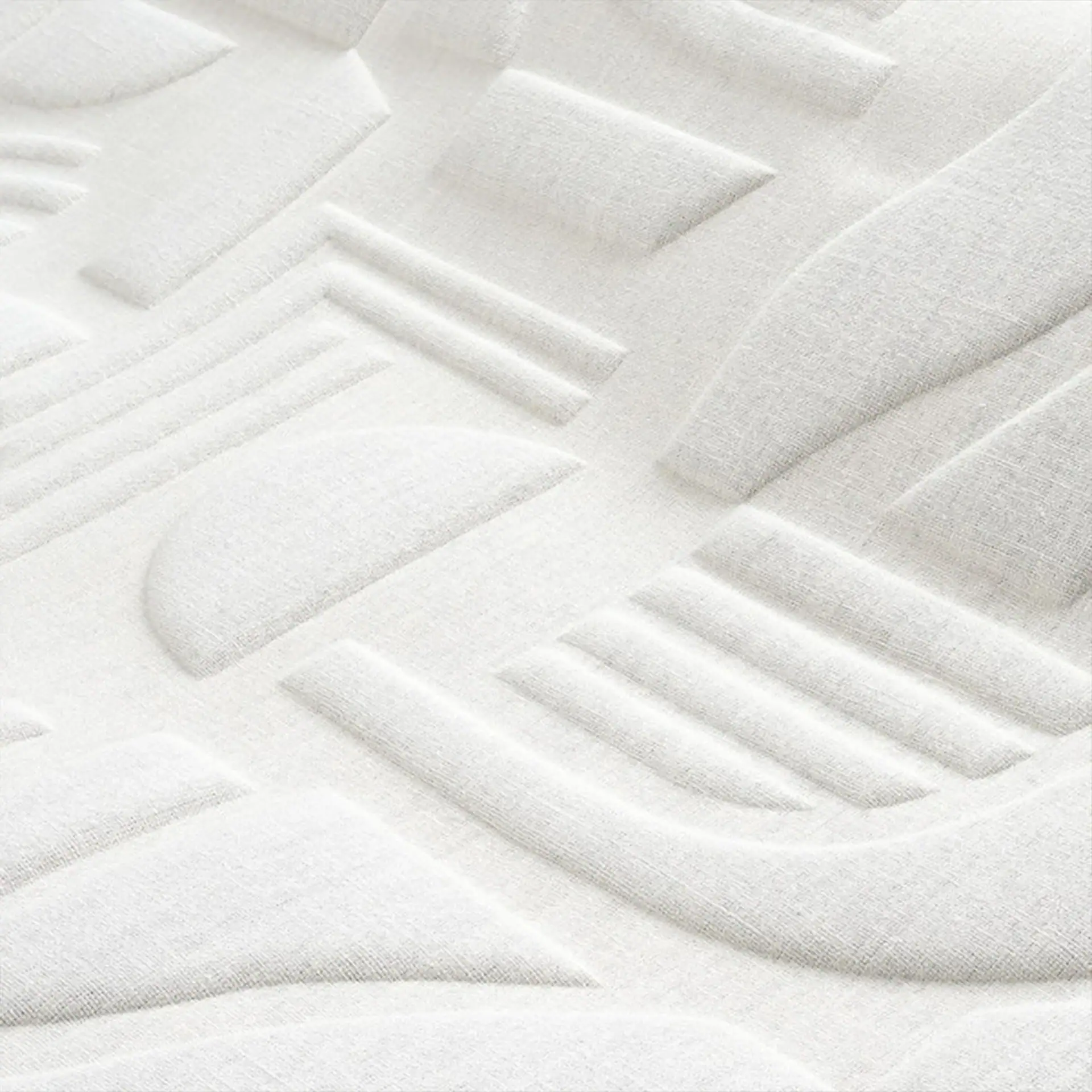 Close-up of textured white Linsolite Wallpaper surface.