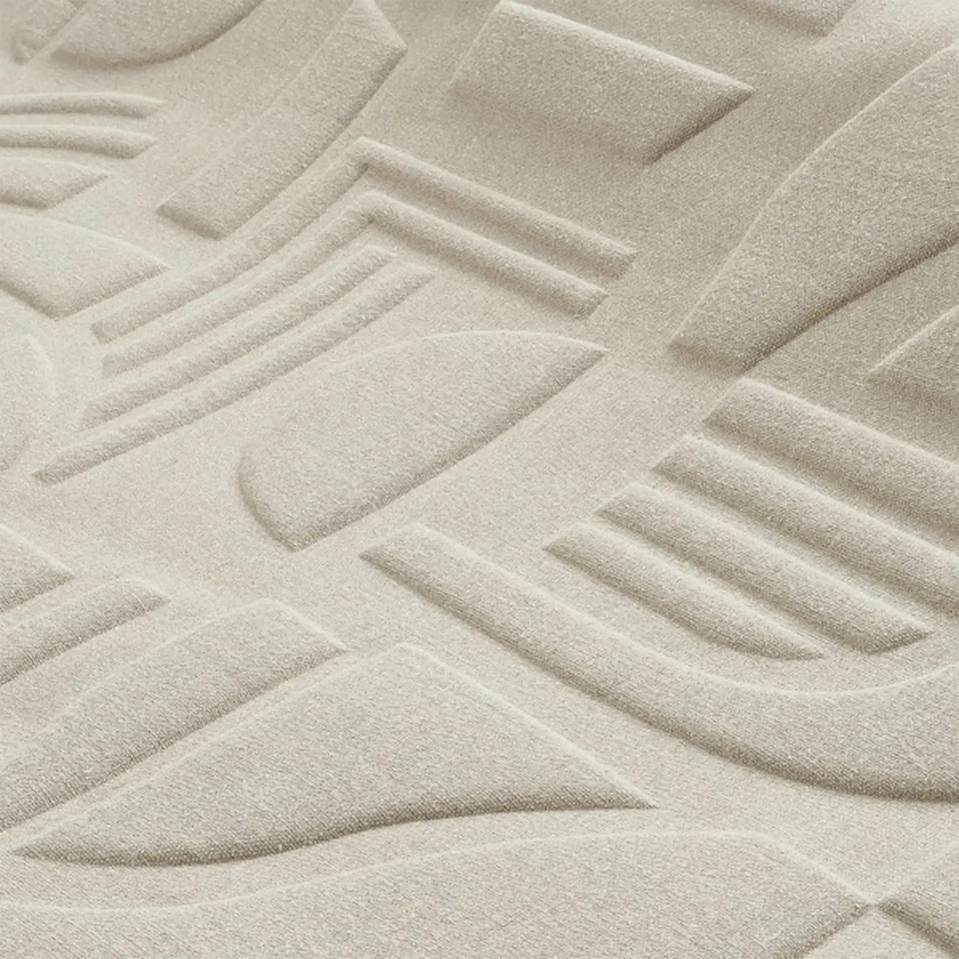 Close-up of Linsolite Wallpaper with textured geometric pattern.