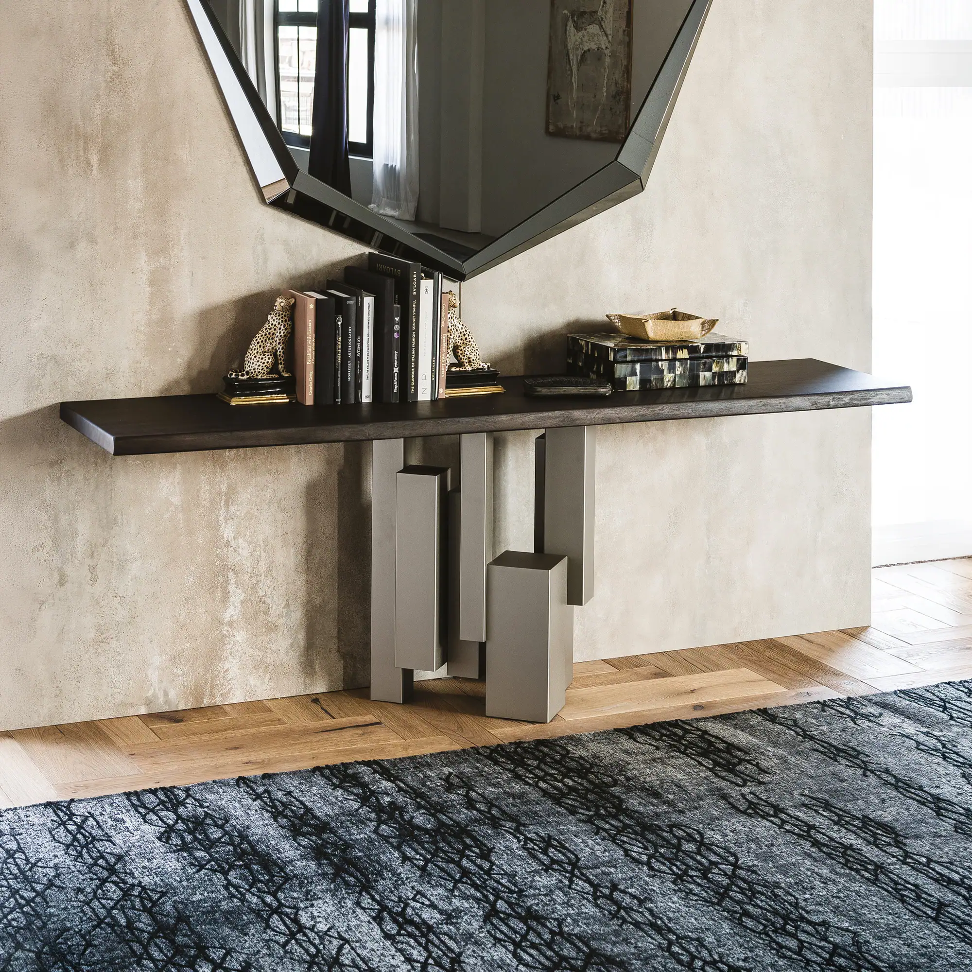 Skyline Console with decorative items and books.