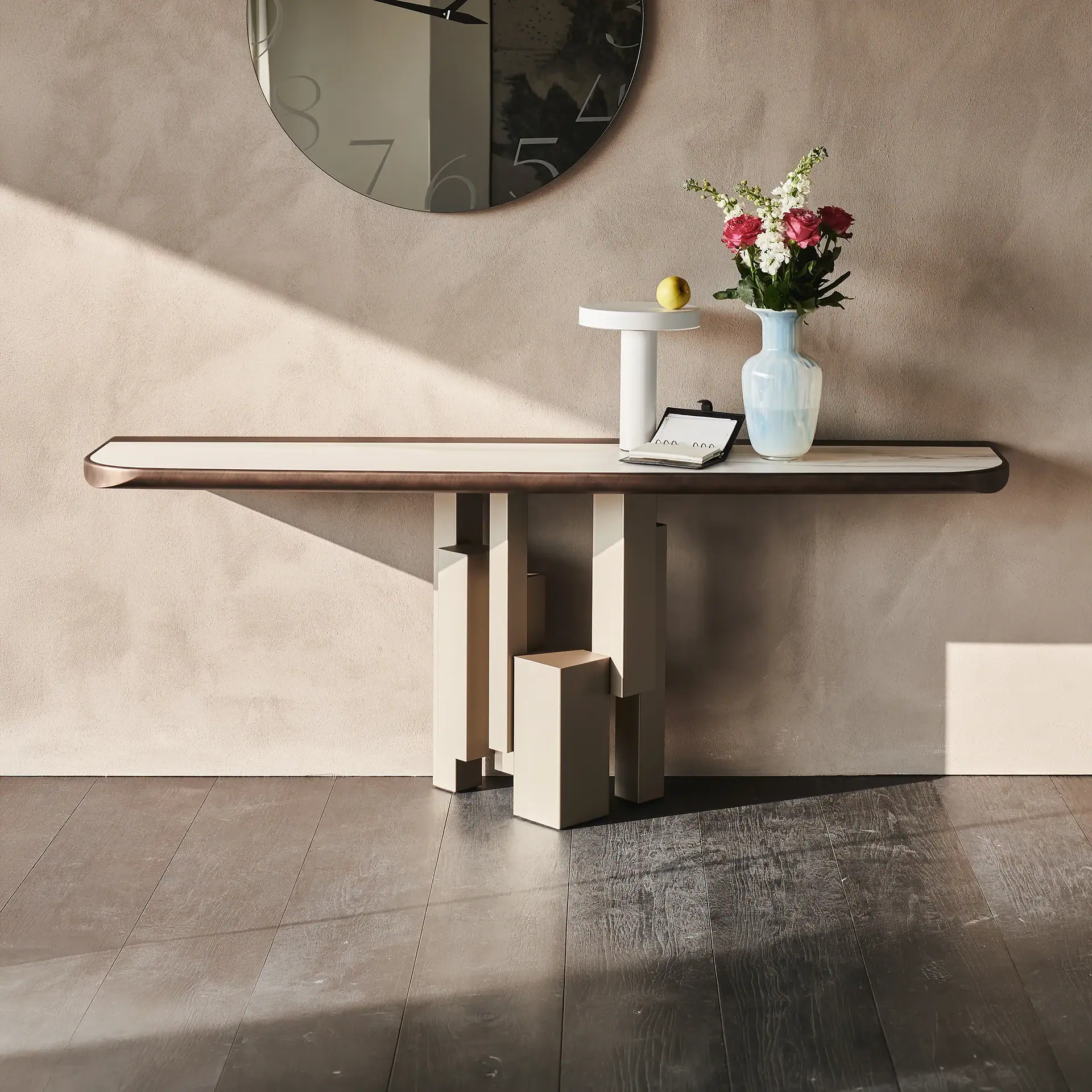 Skyline Console table with decorative items in a modern interior.