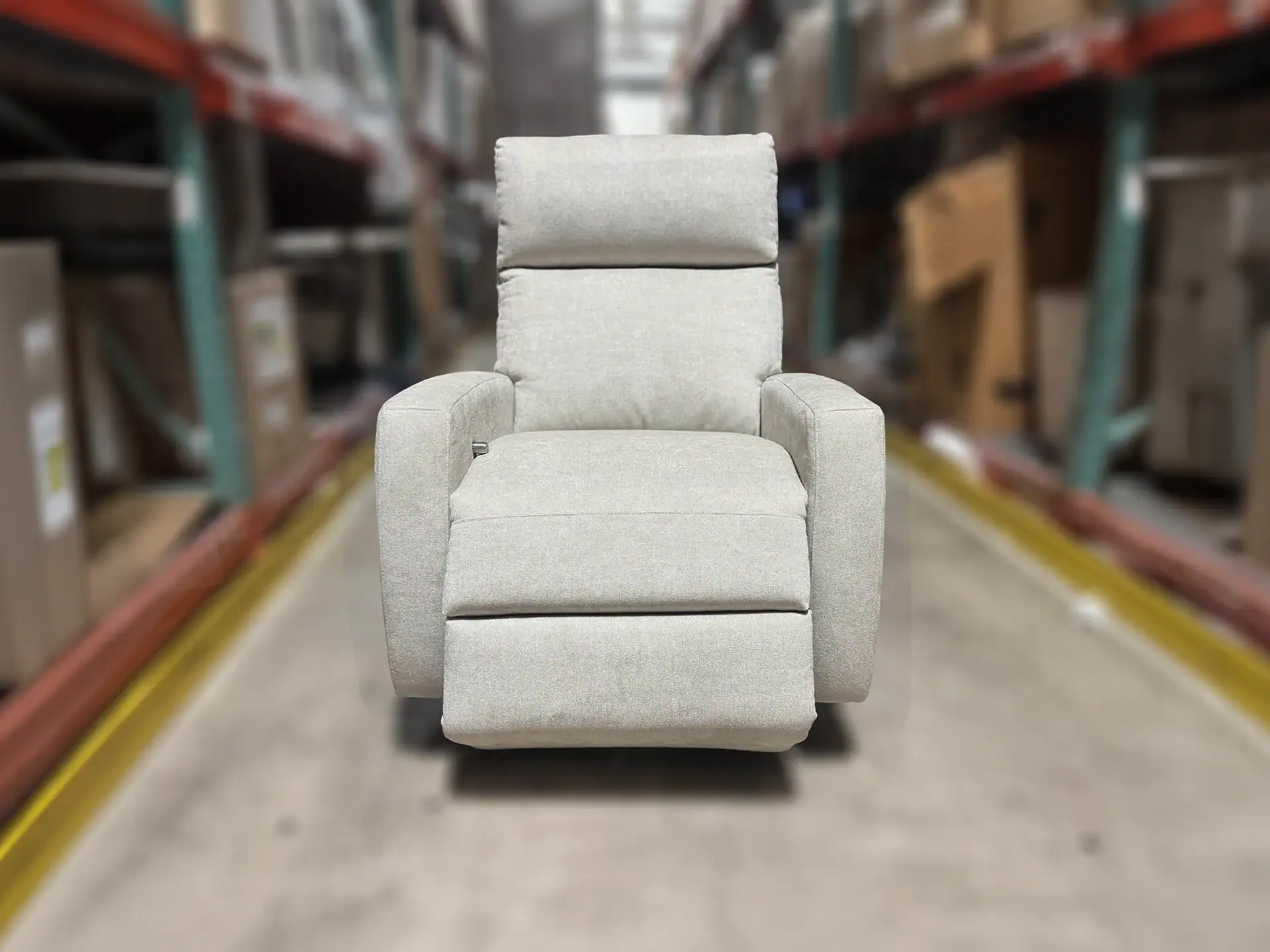 American Leather Elliot Recliner in a warehouse setting.
