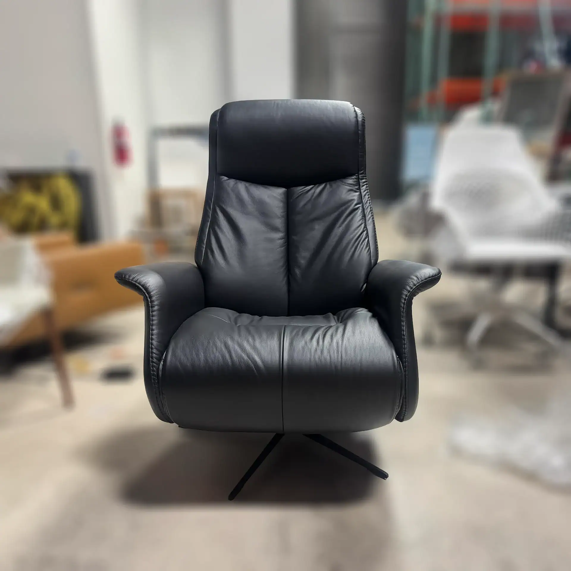 Sklar Furnishings Jakob Large CF Relaxer Recliner in black leather.