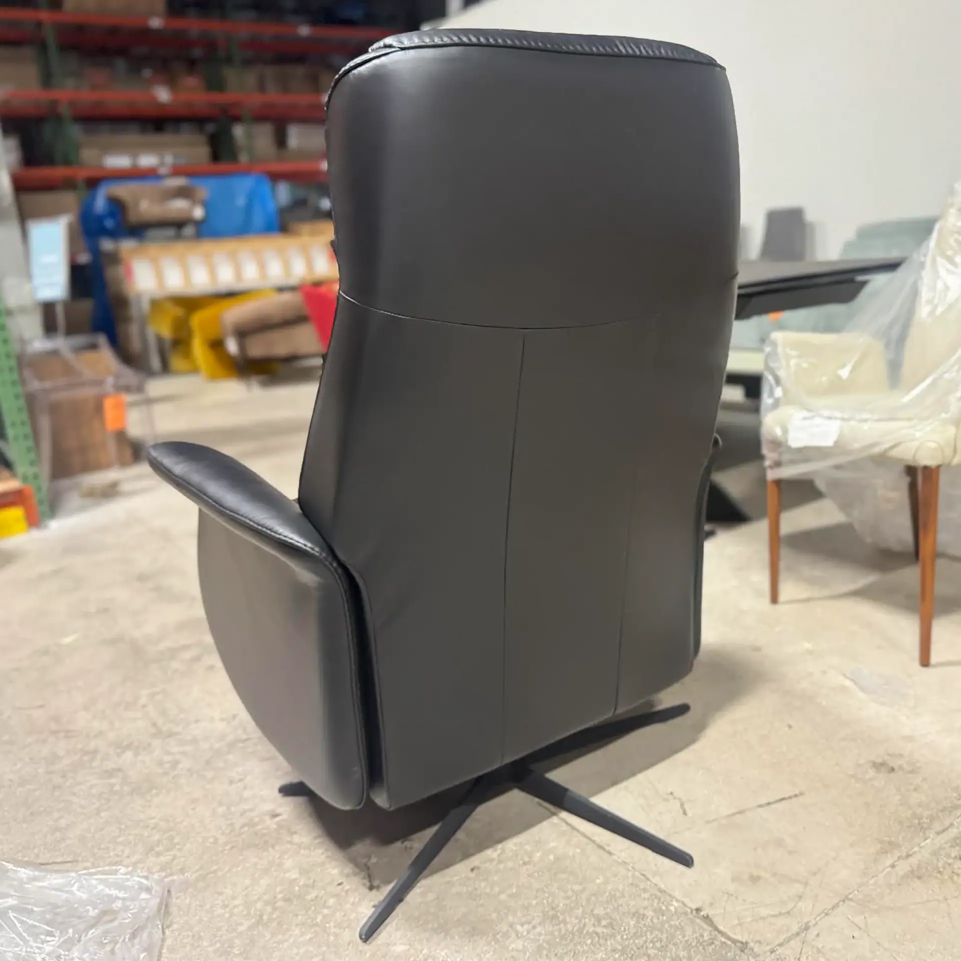 Sklar Furnishings Jakob Large CF Relaxer Recliner in black leather.