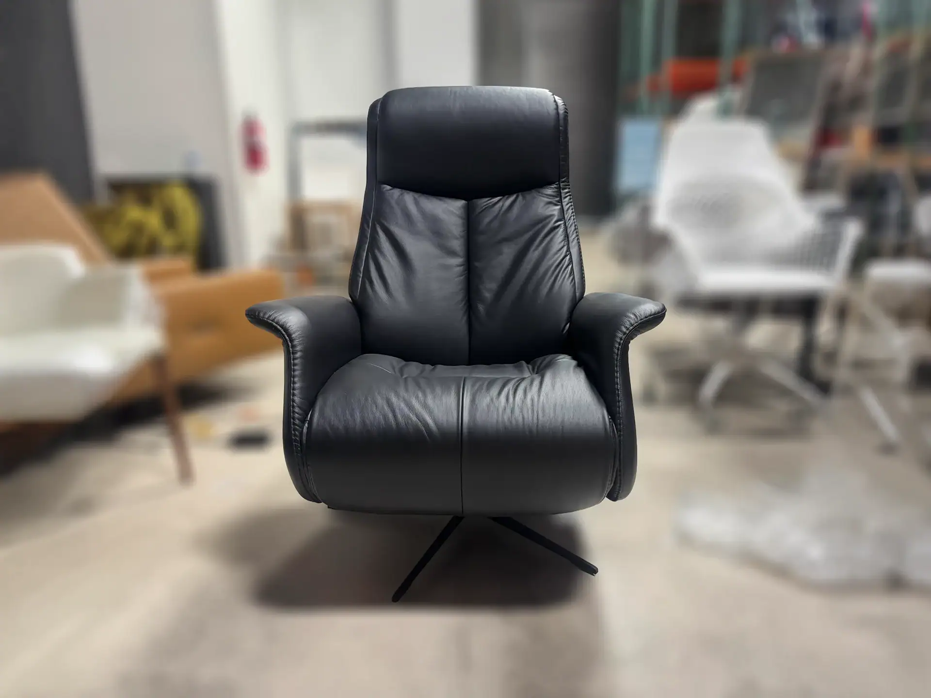 Sklar Furnishings Jakob Large CF Relaxer Recliner in black leather.
