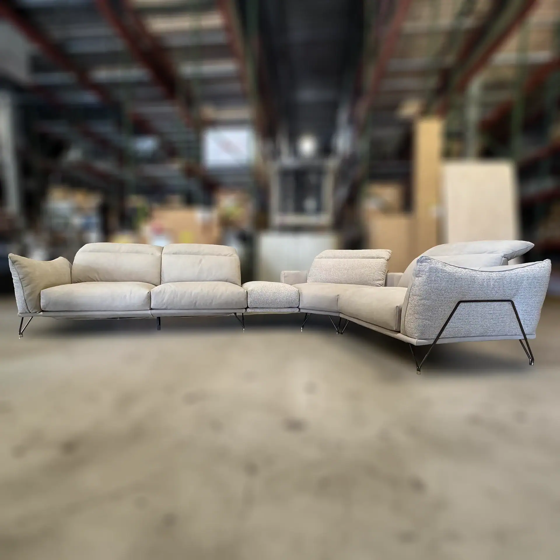 Gorini Dagor sectional sofa in a warehouse setting.