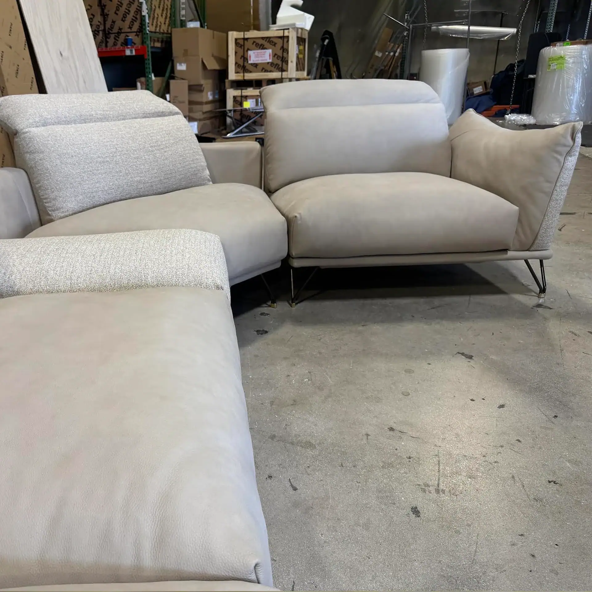 Gorini Dagor sectional sofa in a warehouse setting.