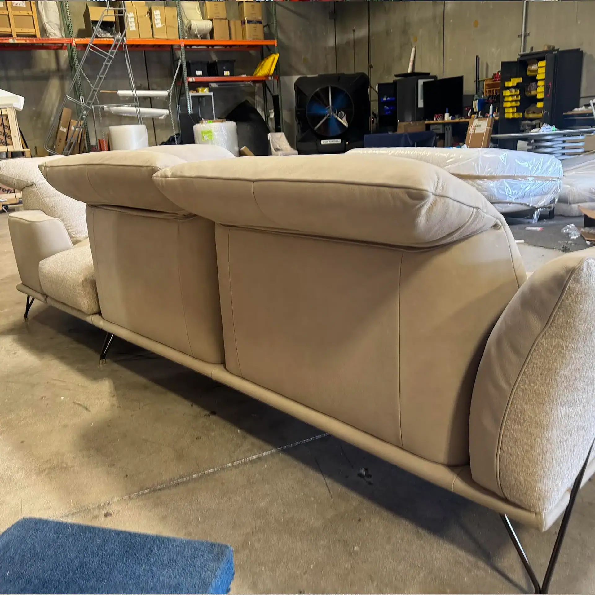 Gorini Dagor sectional sofa in a warehouse setting.