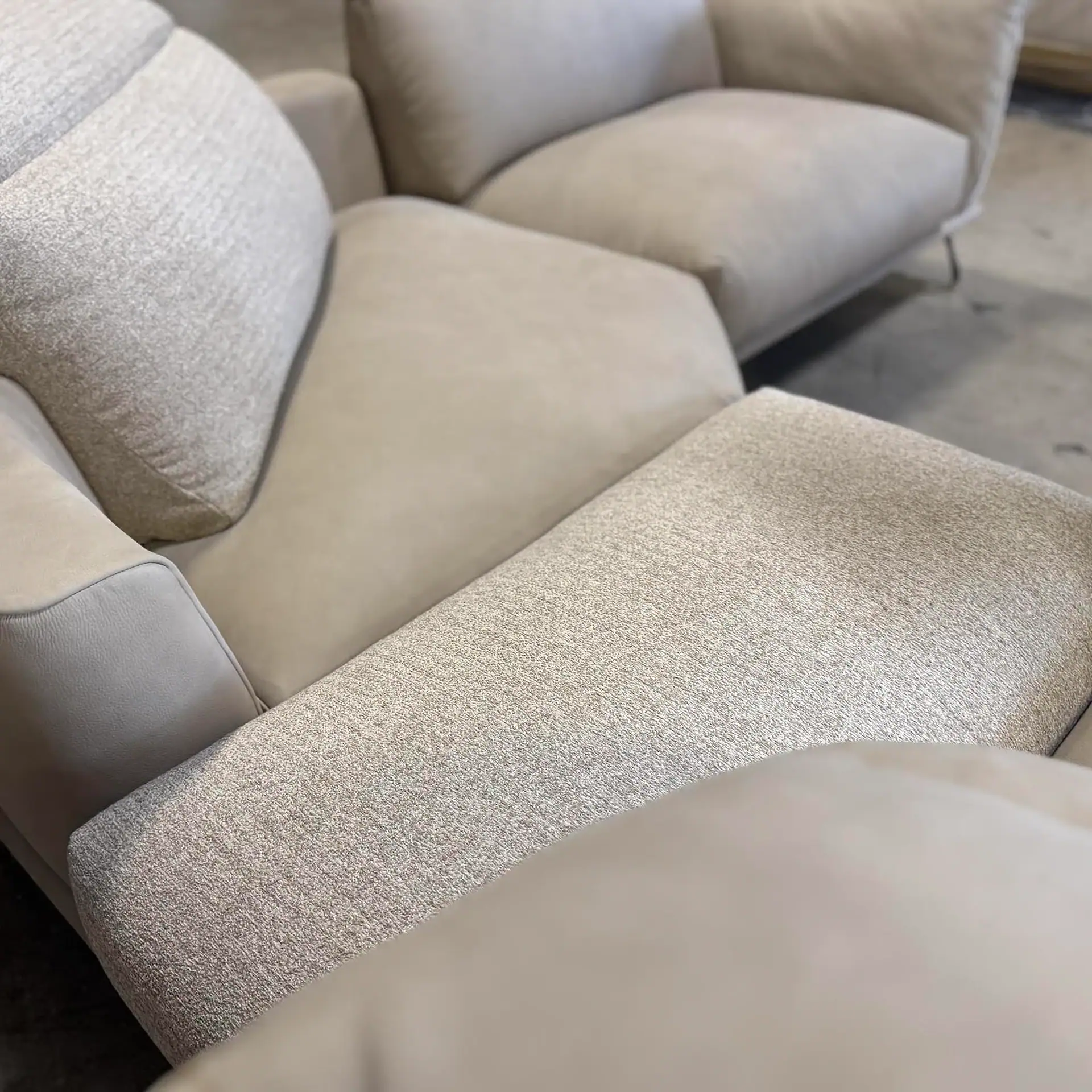 Gorini Dagor sectional sofa in a neutral fabric with plush cushions.