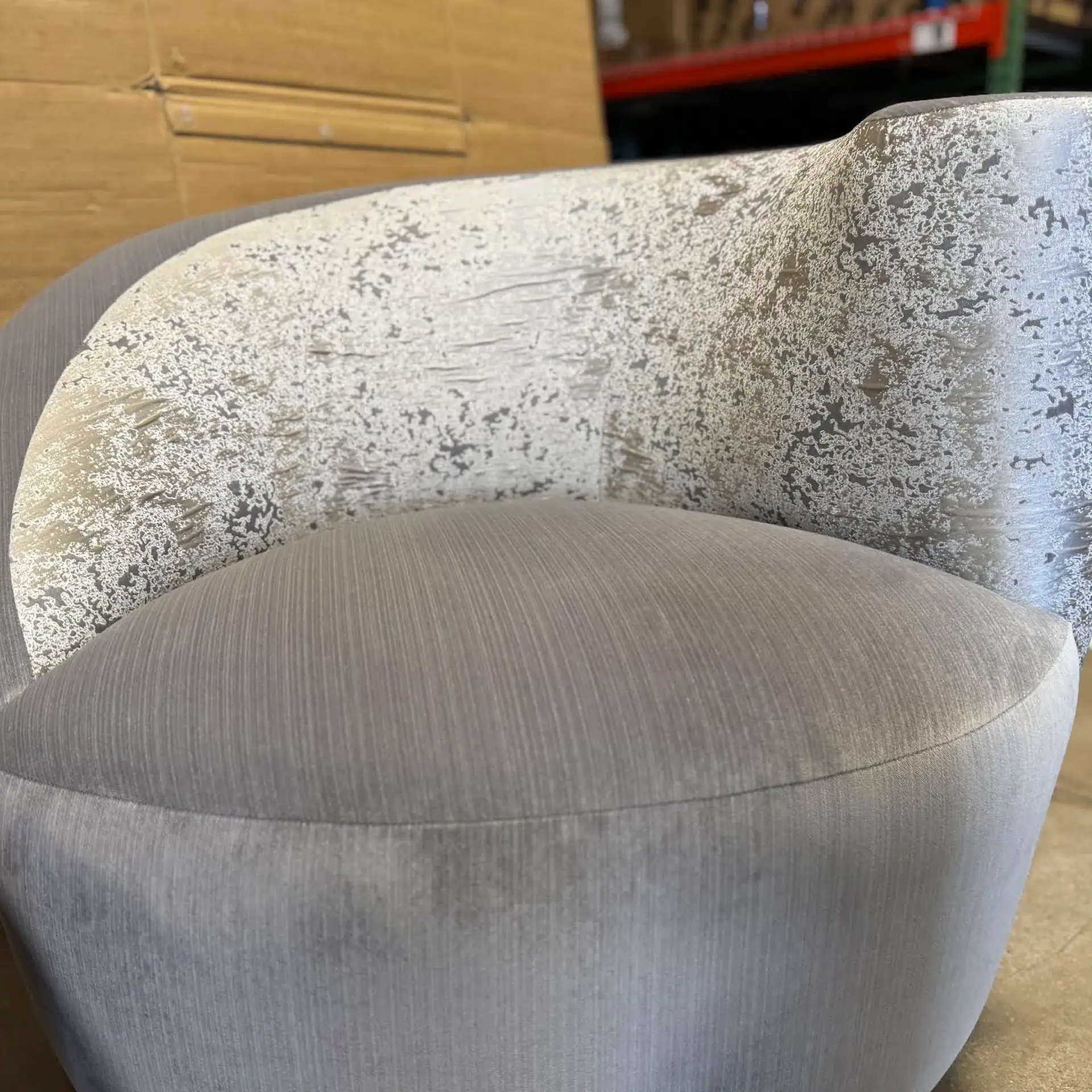 Lazar Scroll Swivel Chair with distressed finish and fabric seat.