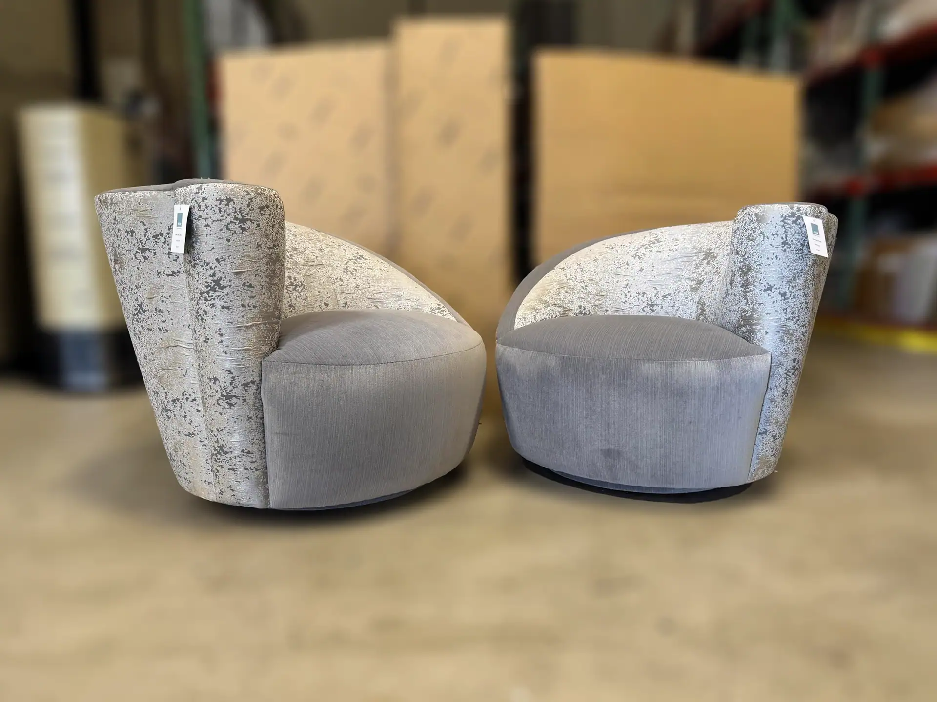Lazar Scroll Swivel Chairs set of 2 with curved design and plush upholstery.