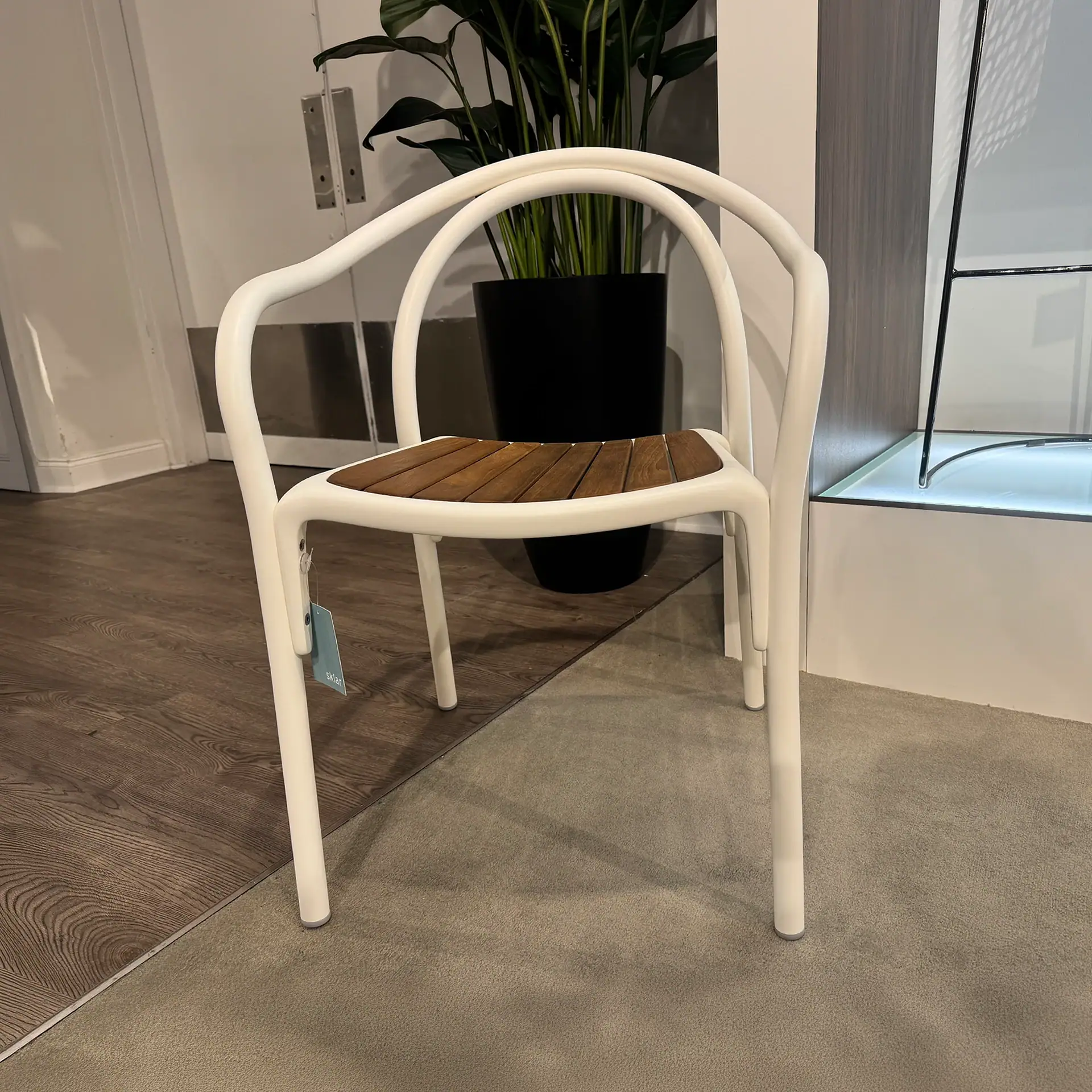 Pedrali 3746 Soul Armchair with wooden seat and white frame in interior setting.