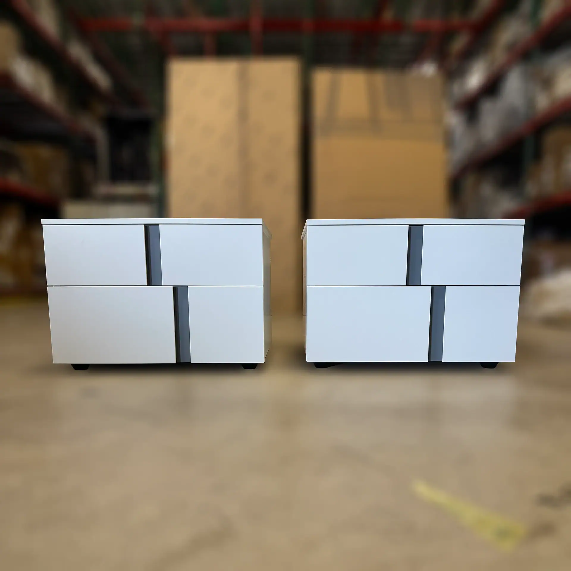 Sklar Furnishings Athena 2-Drawer Nightstand set in a warehouse.