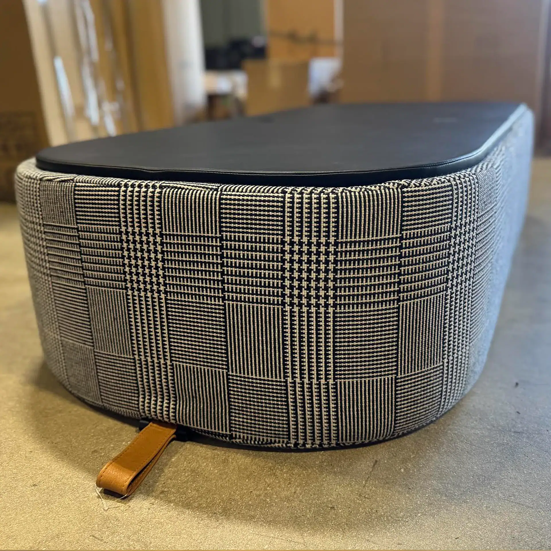 Tumidei Flip Open Armchair with plaid fabric and black top.