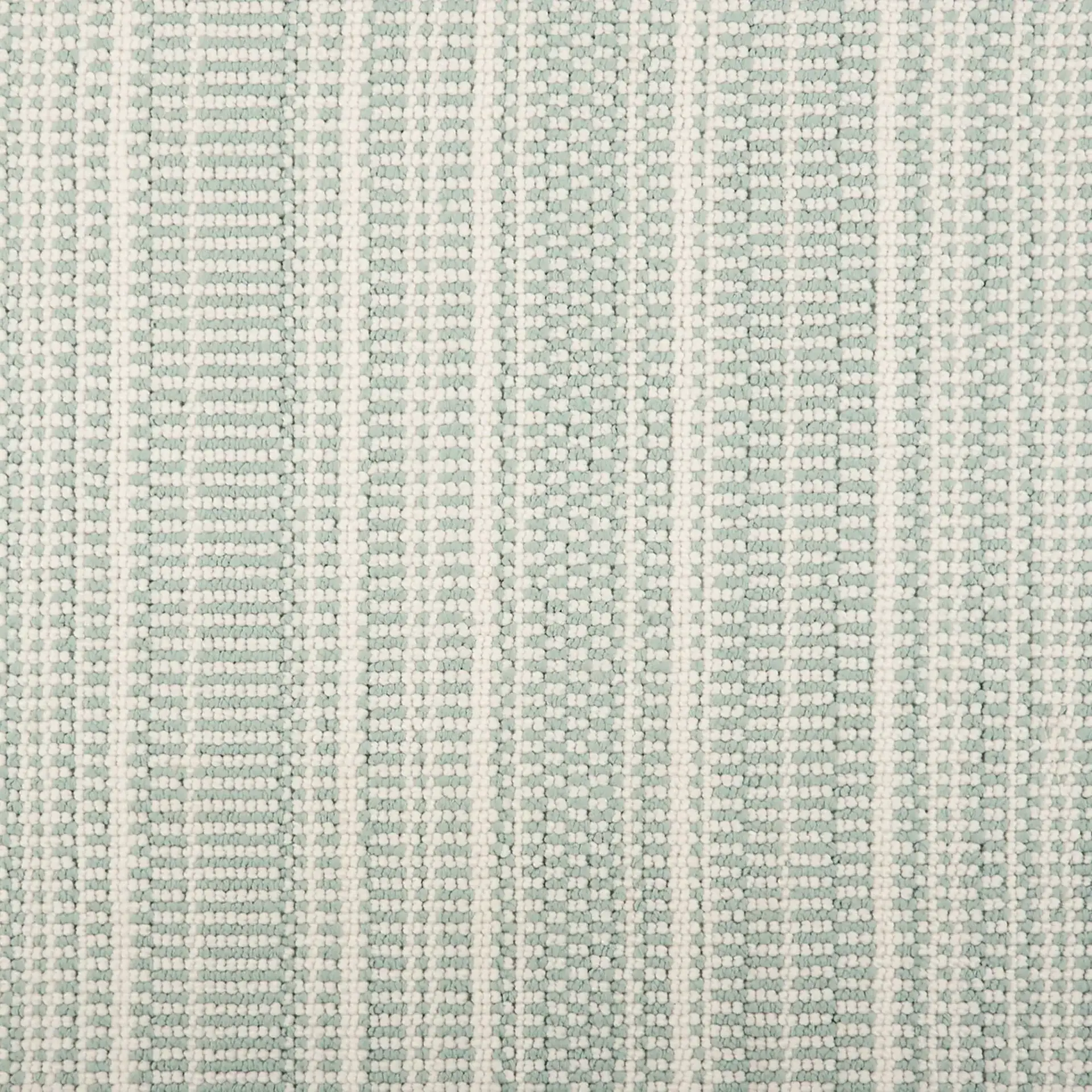 Waveside indoor outdoor area rug with striped pattern in light colors.
