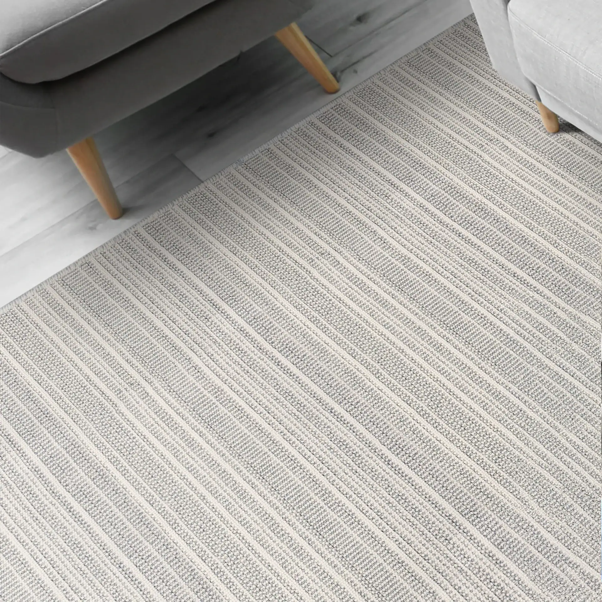 Waveside indoor outdoor area rug with striped pattern in neutral tones.