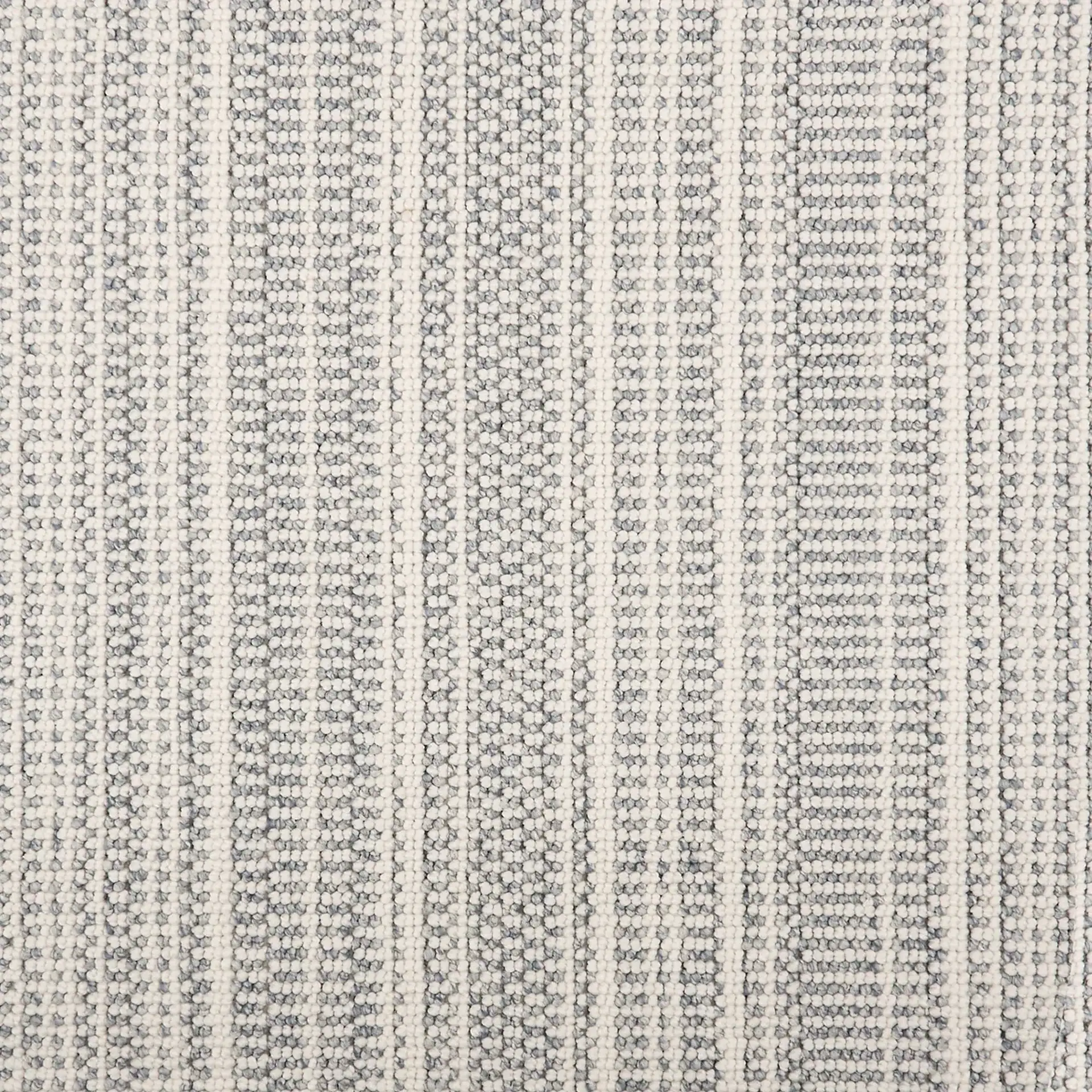 Waveside indoor outdoor area rug with striped pattern in neutral tones.