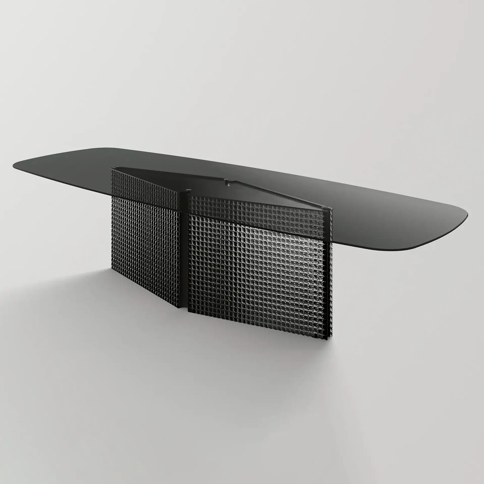 Sklar Furnishings dining table with a sleek black glass top and unique textured base.