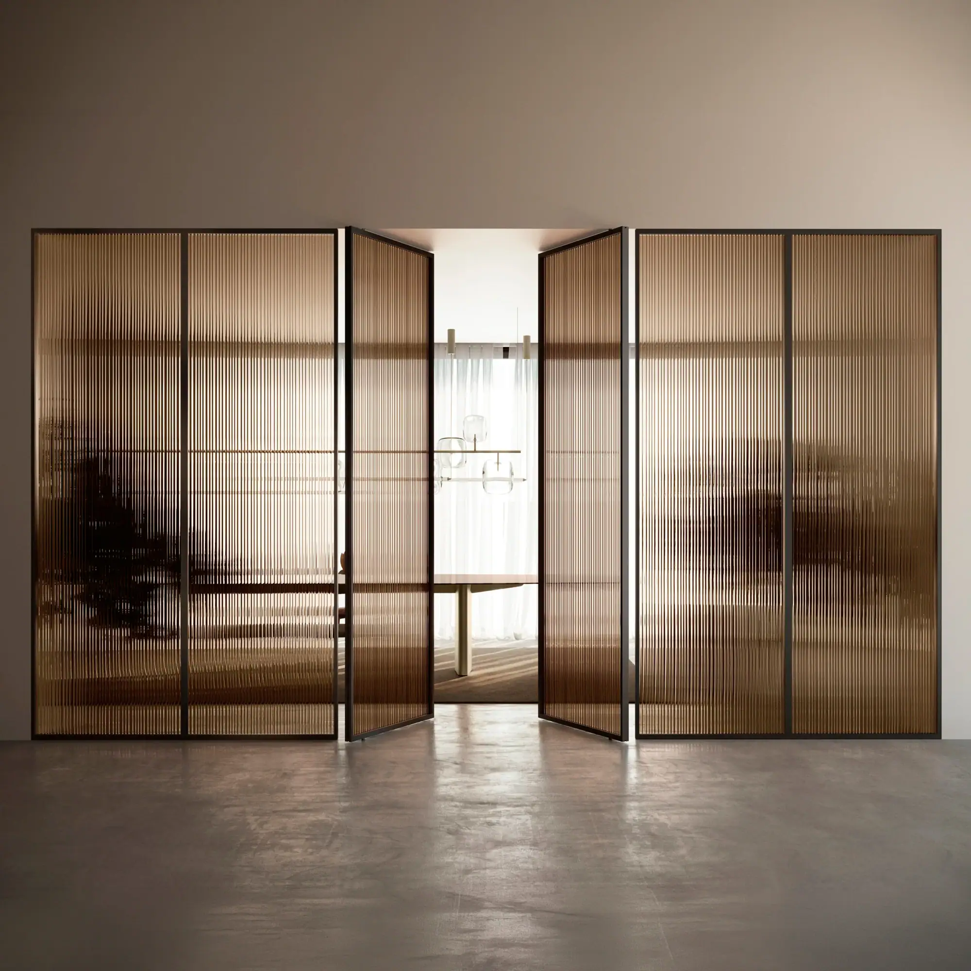Four amber-tinted fluted glass room dividers with dark frames, two of which are slightly open, revealing a bright room with a wooden table and a modern chandelier.