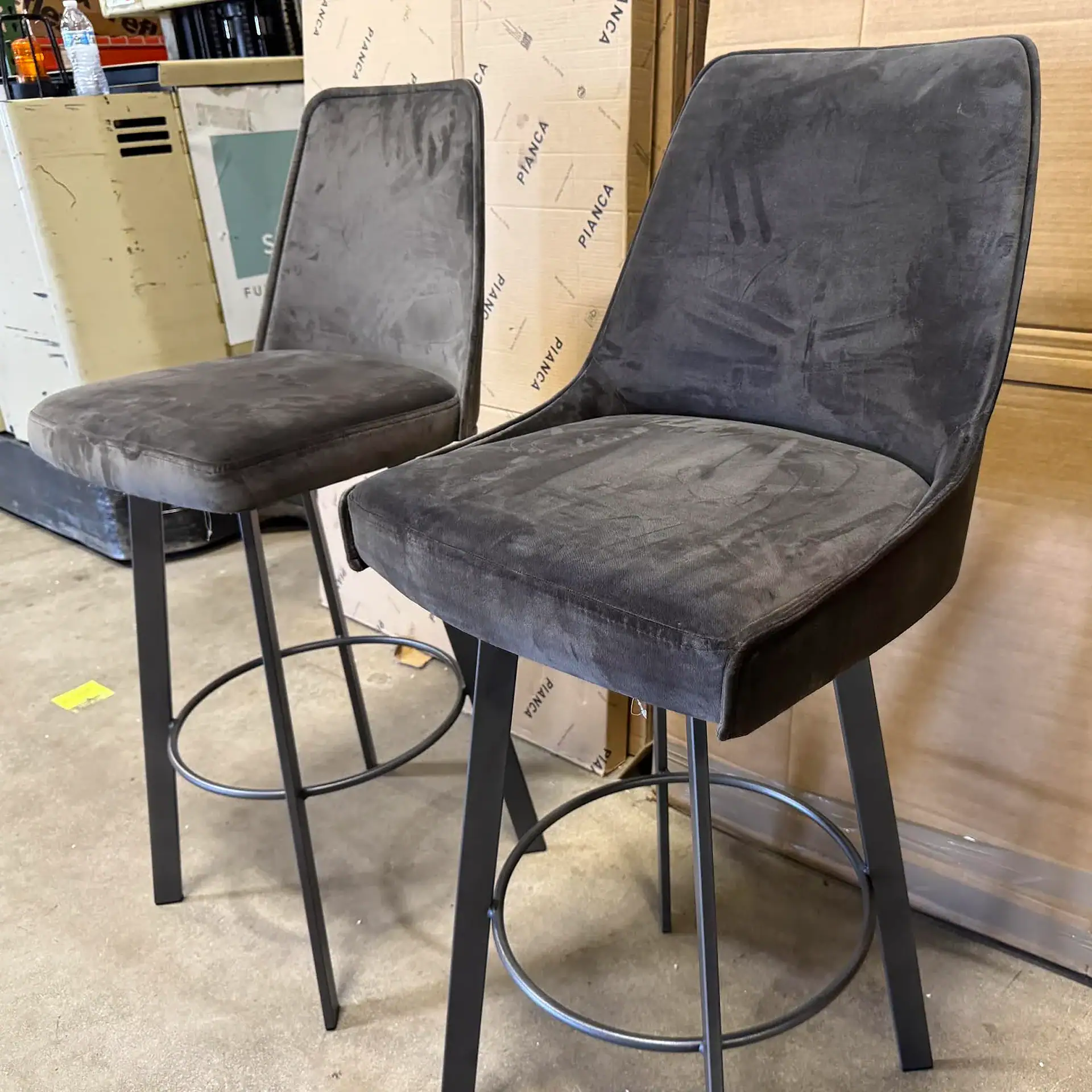 Sklar Furnishings Sofia & Olivia bar stools with gray velvet upholstery.