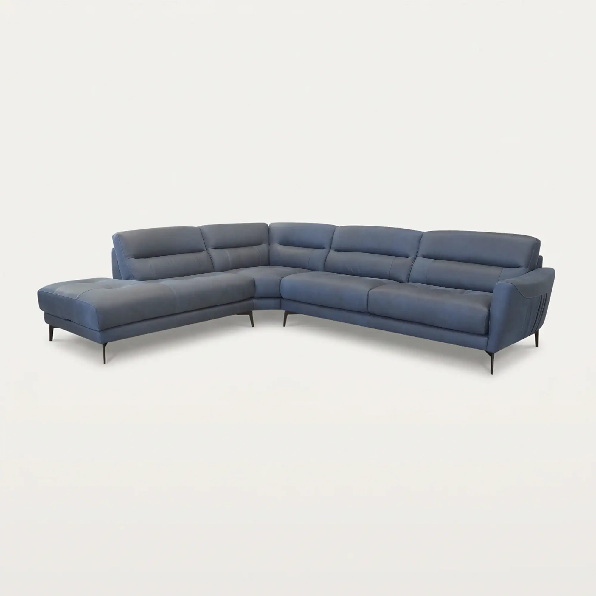 A modern L-shaped sectional sofa in a deep blue color with a chaise lounge on the left, set against a white background.