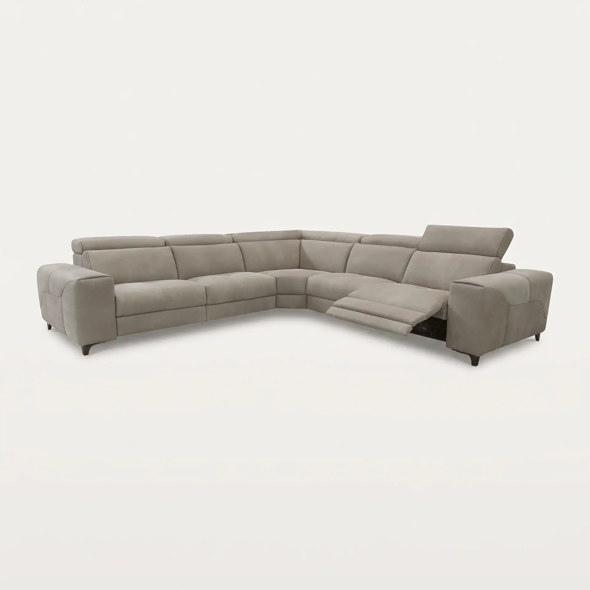 Light taupe L-shaped sectional sofa with an extended recliner and adjustable headrest on a light gray background.