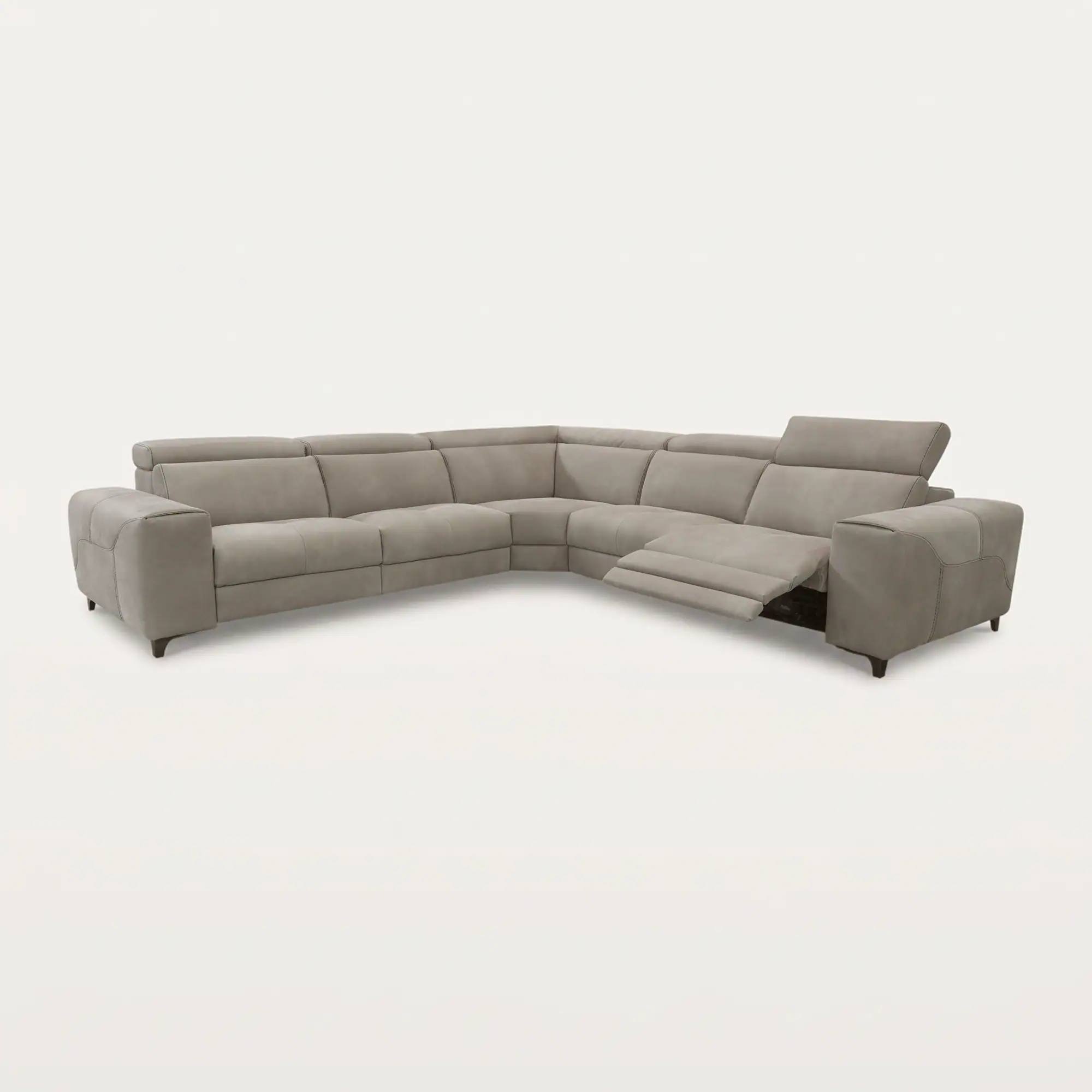Light taupe L-shaped sectional sofa with an extended recliner and adjustable headrest on a light gray background.