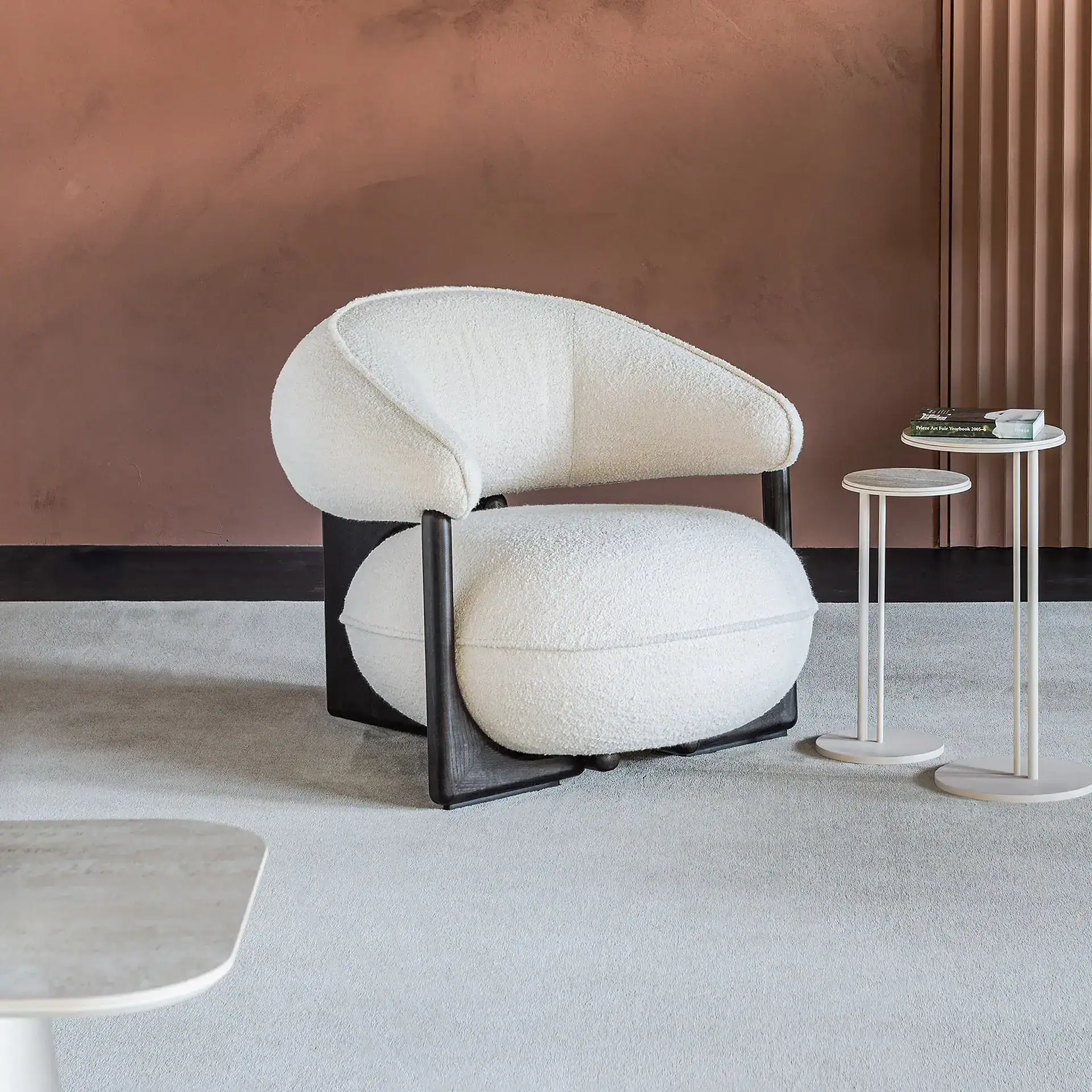 Sklar Furnishings modern armchair with black frame and cream upholstery.