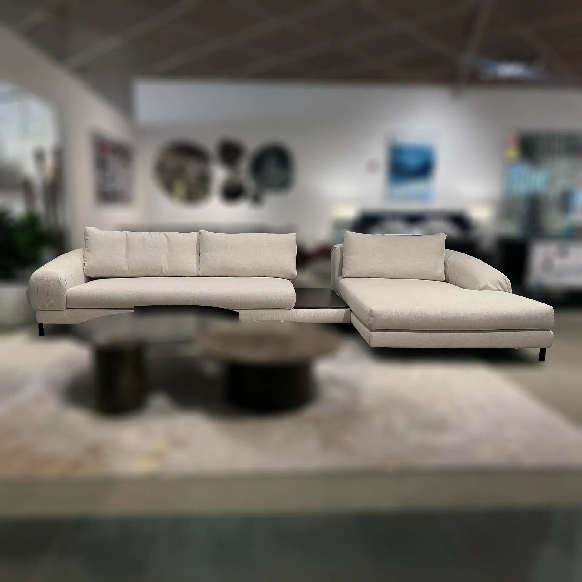 Nicoline Crumble Sectional Sofa in a showroom setting.